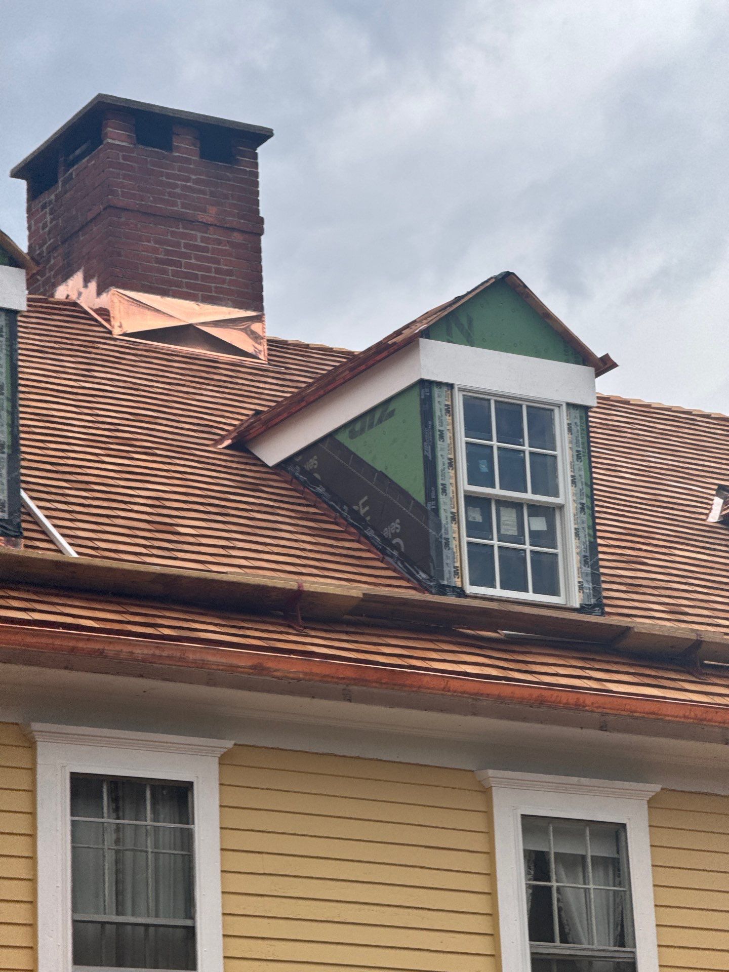 Red Cedar Roofing, Copper Gutters + Dormer Build by Rinaldi Brothers