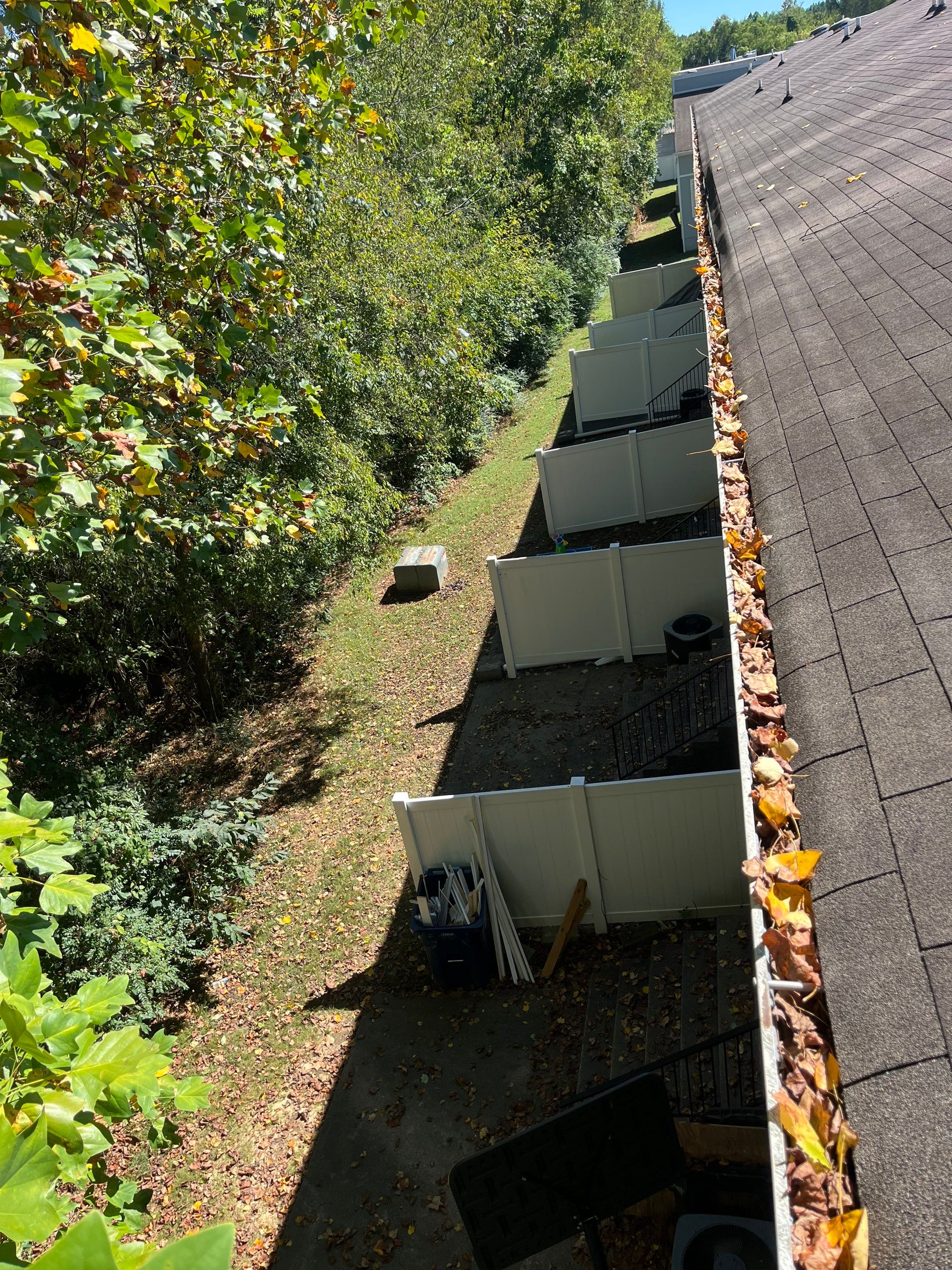 Commercial gutter cleaning Nashville, TN before photo with filled gutters