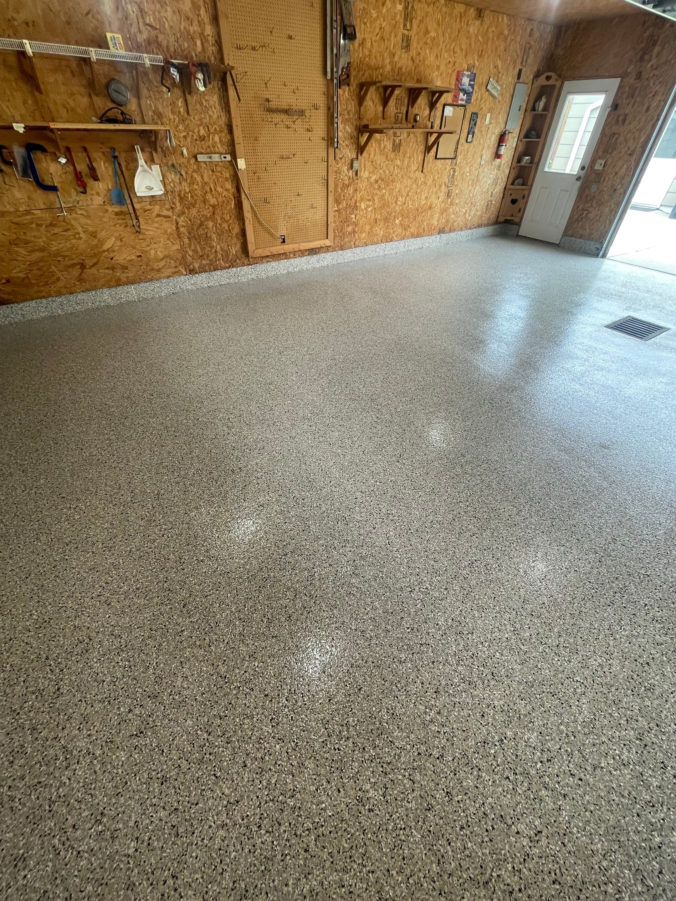 Speckled Epoxy Flake Concrete Coating for Worthington Garage Floor by Select Painting, Coatings & Garage Cabinets