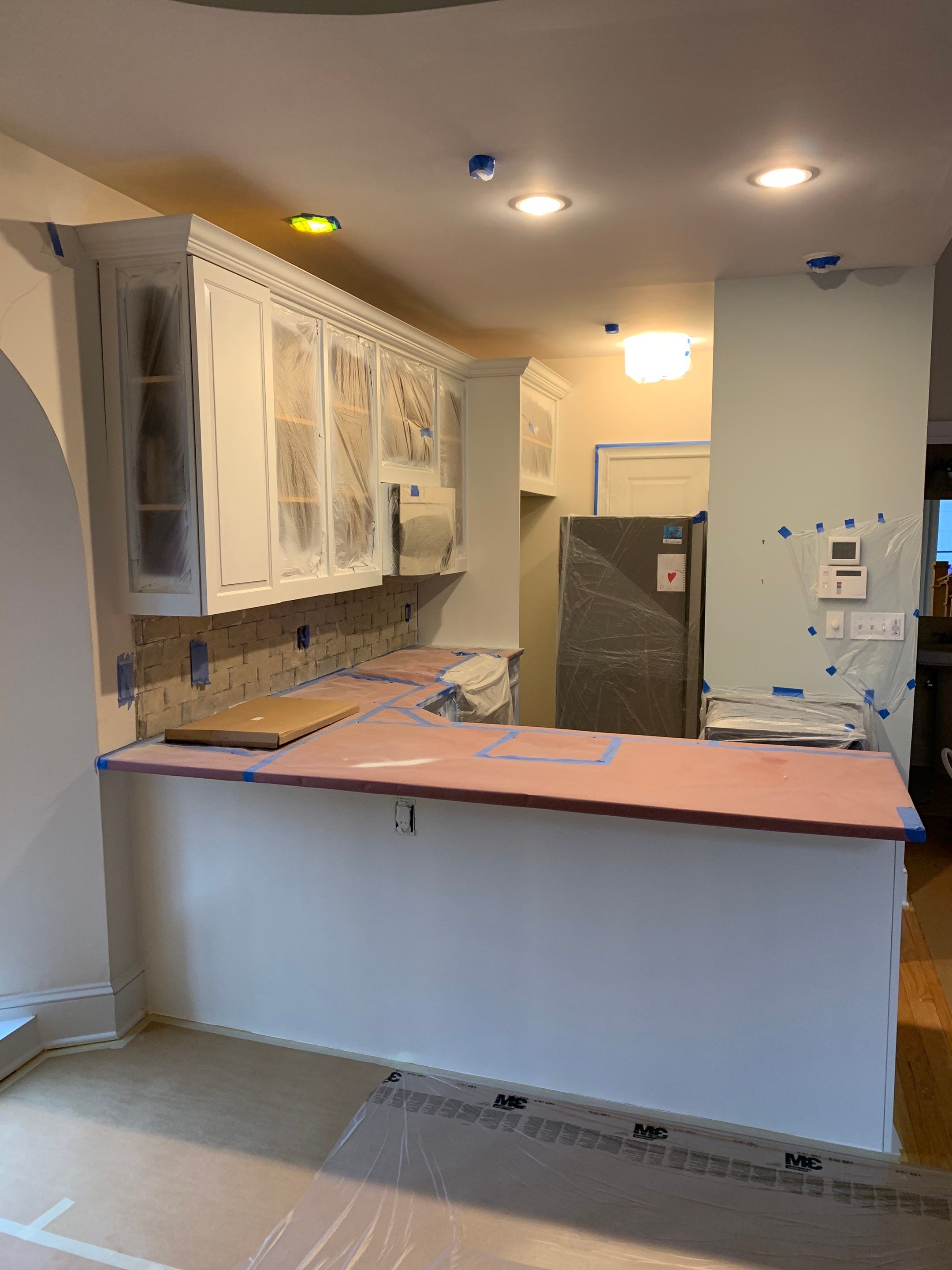 Kitchen Cabinet Painting using Milesi 2k by Trendy Walls Inc.