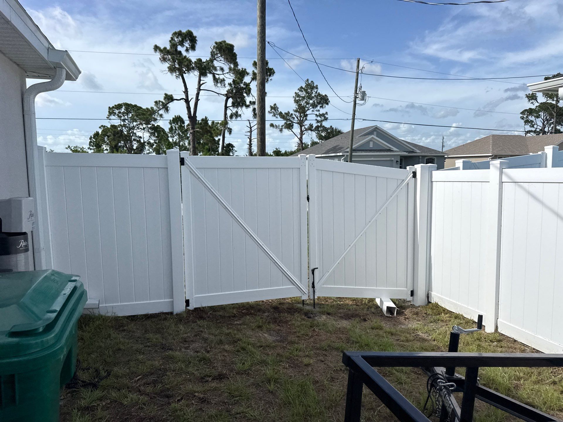 White Vinyl Privacy Fence and Gate Installation in Port Charlotte by True Fence LLC