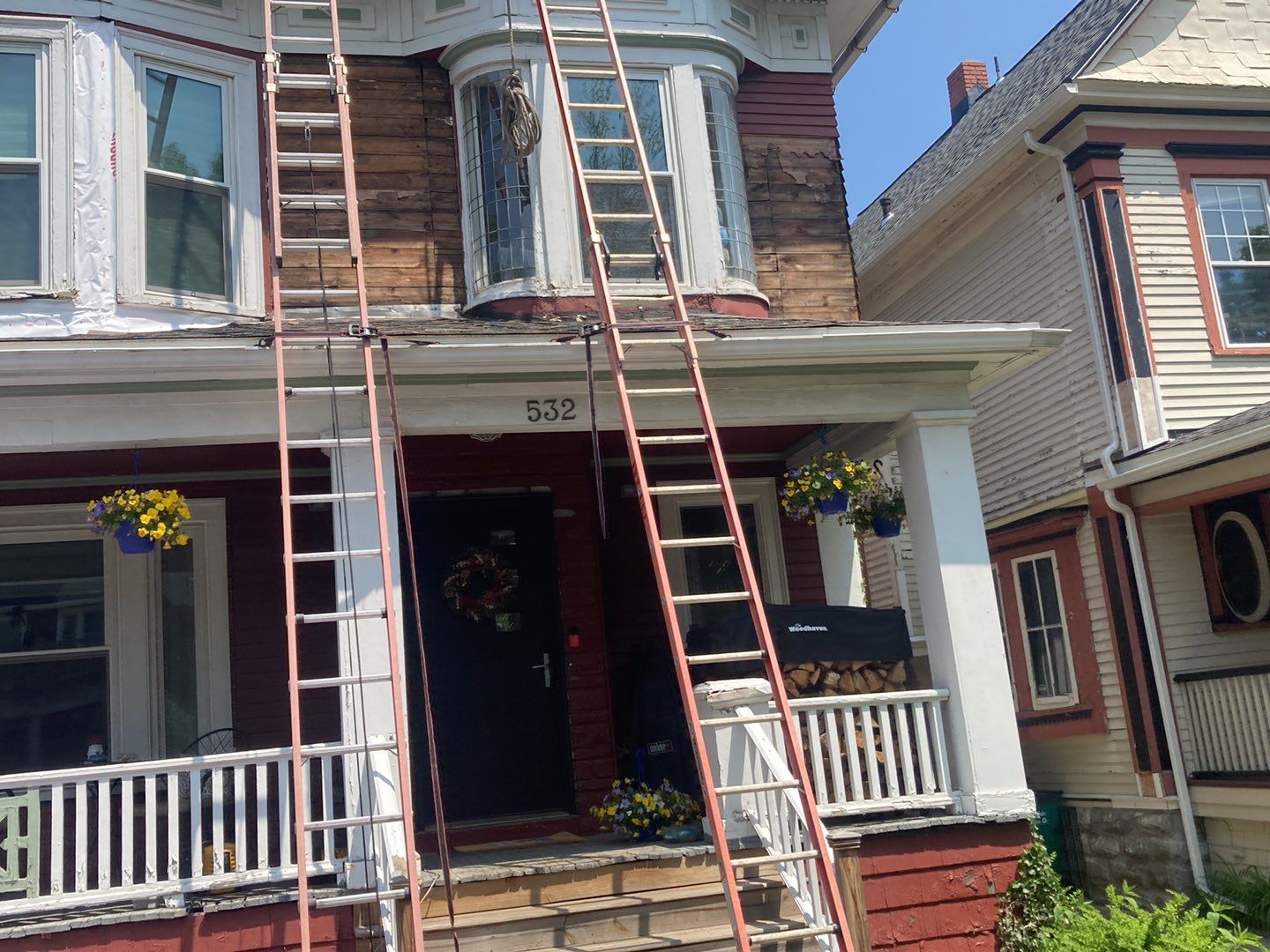 Exterior Renovations- Siding, Stamped Concrete, Porch, and Railings by Ivy Lea Construction