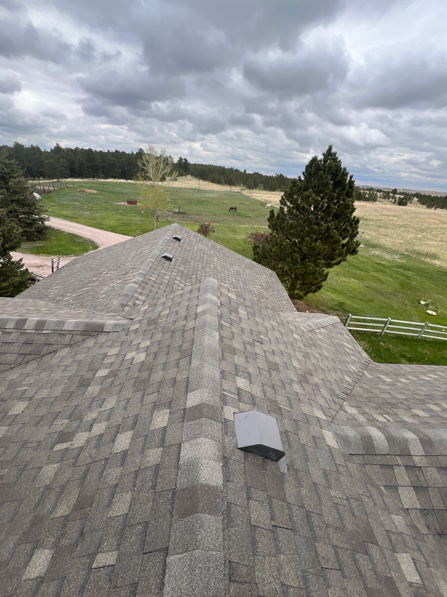Residential Roofing Installation using Atlas Pinnacle Impact Weathered Wood by Blue Peaks Roofing LLC 