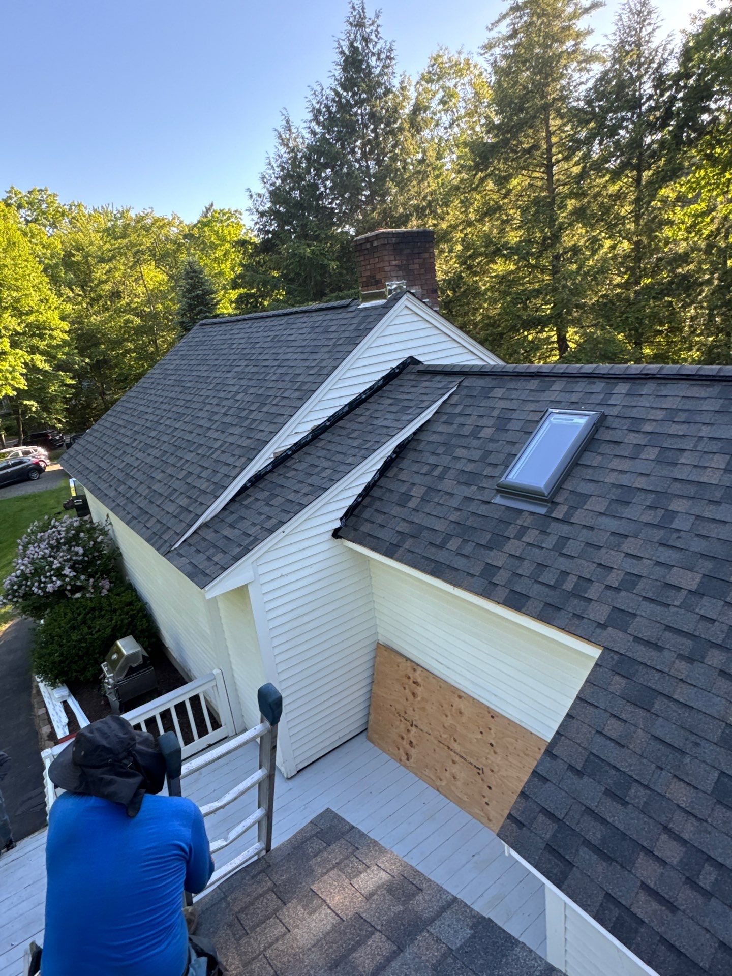 Bedford, NH Roof Replacement with Rot Repair, New Skylights & Owens Corning Duration Peppercorn Shingles by Compass exteriors