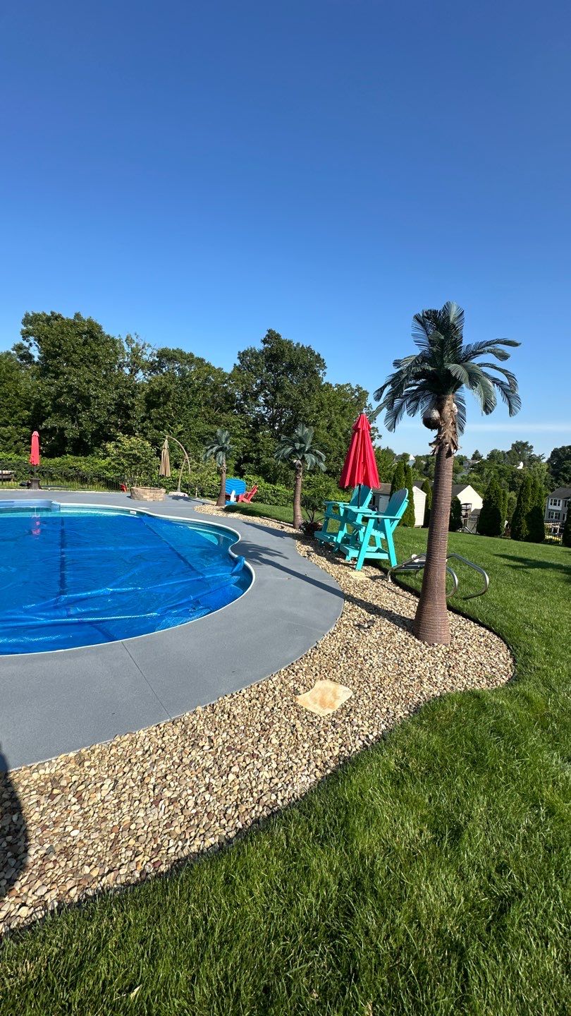 Twilight Pool Deck / Patio Project in Beaver falls by Floors in a Day, Inc