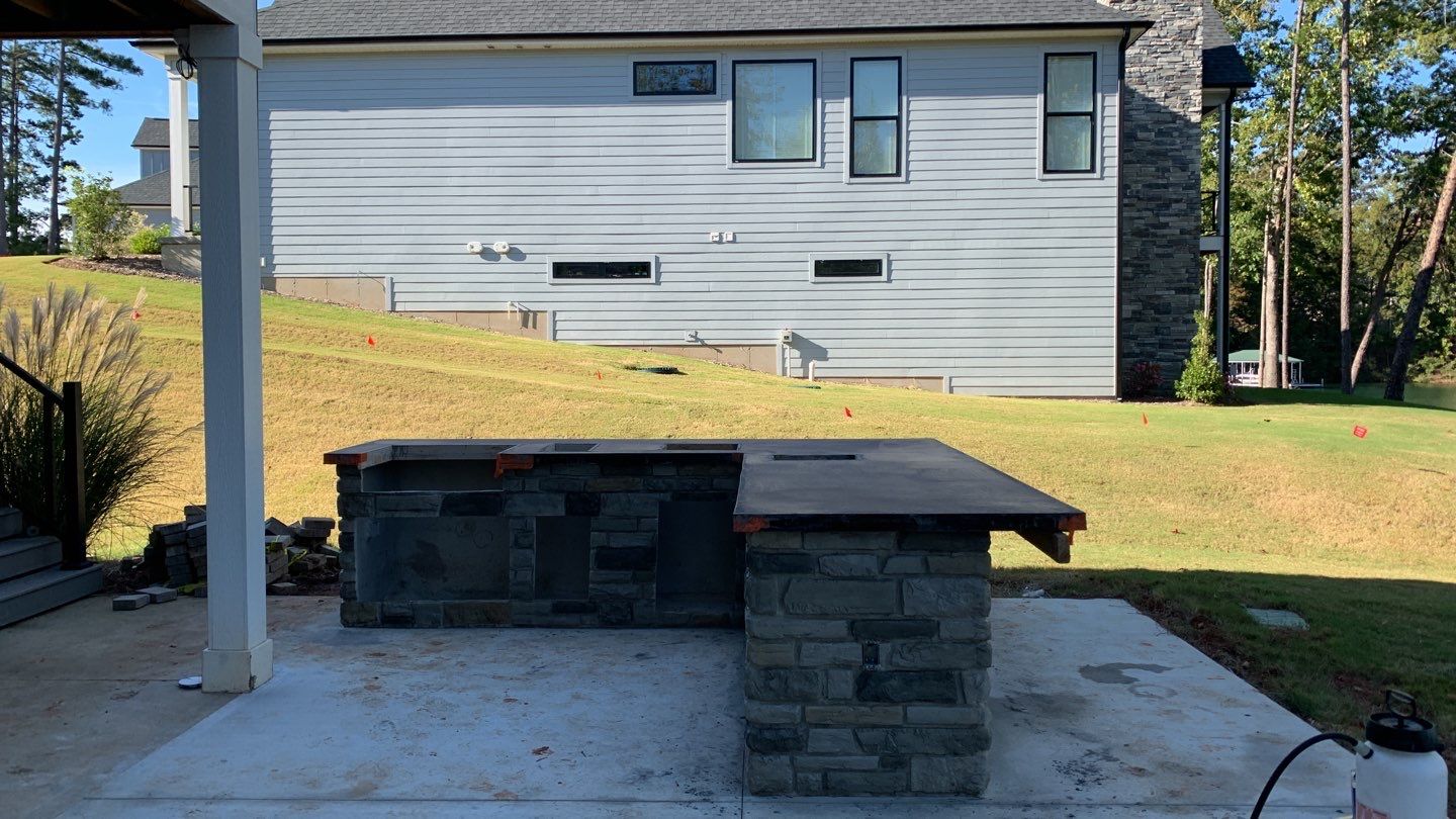 Outdoor Kitchen on Lake Keowee by Xtreme Concrete Services