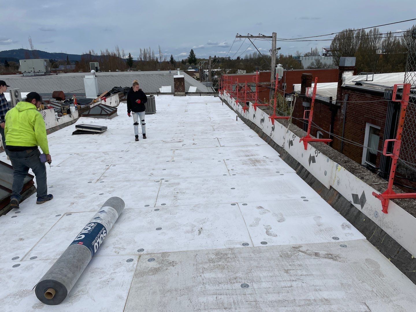 Commercial Flat Roof Installation using GAF 60Mil TPO  by Orezona Building & Roofing Company, Inc.