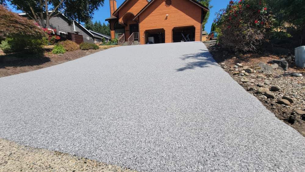 Steep Driveway Strength in Poseidon Vuba Stone  by Concrete Coating Experts Inc.