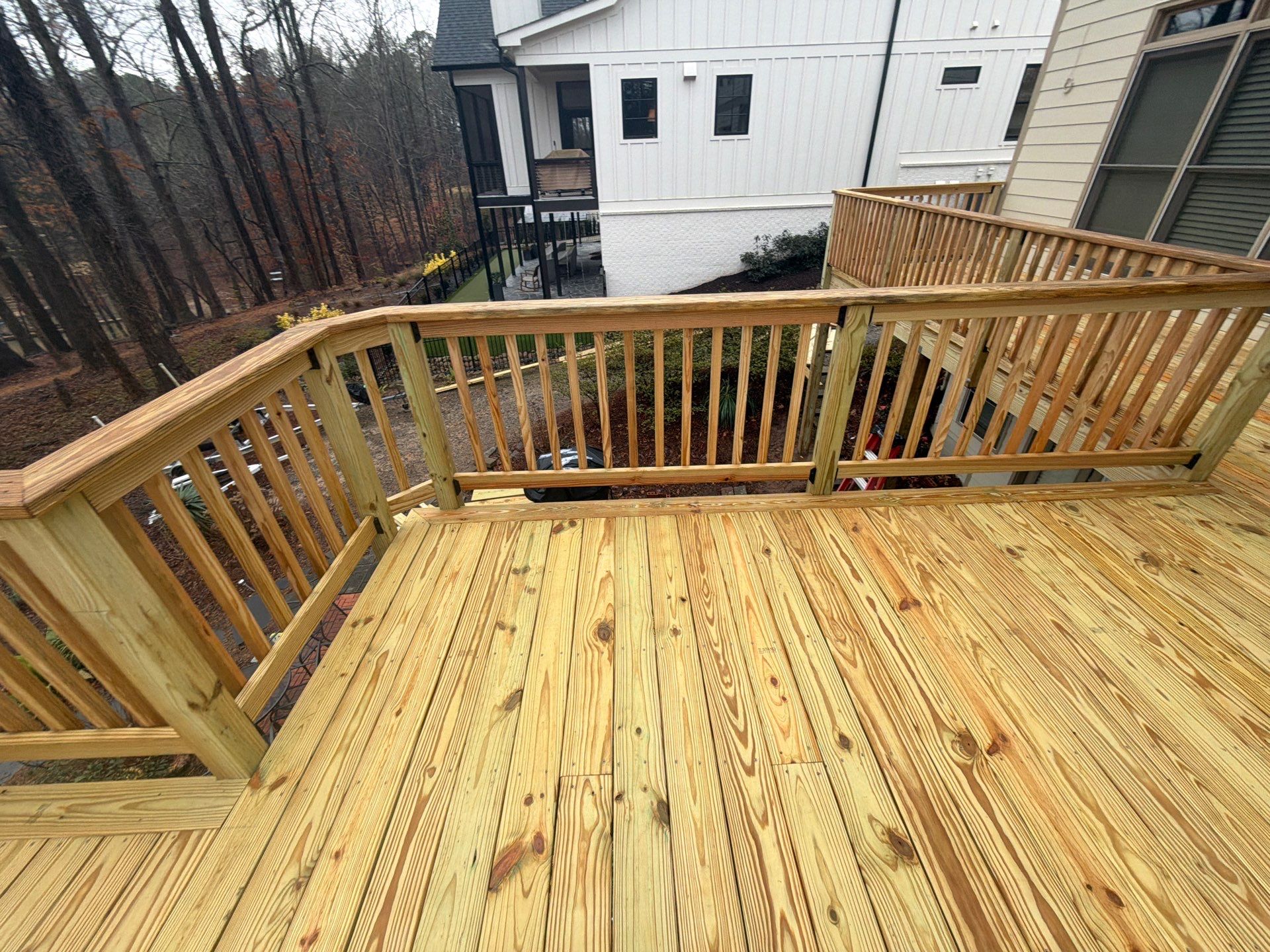 Buford, GA Deck Resurface and Extension using Pressure Treated Pine by Nelson Exteriors