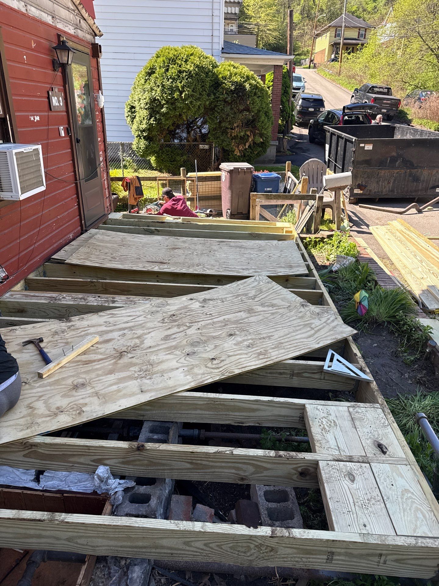 Roof sunspace deck  by Cousins Roofing Siding & Decks