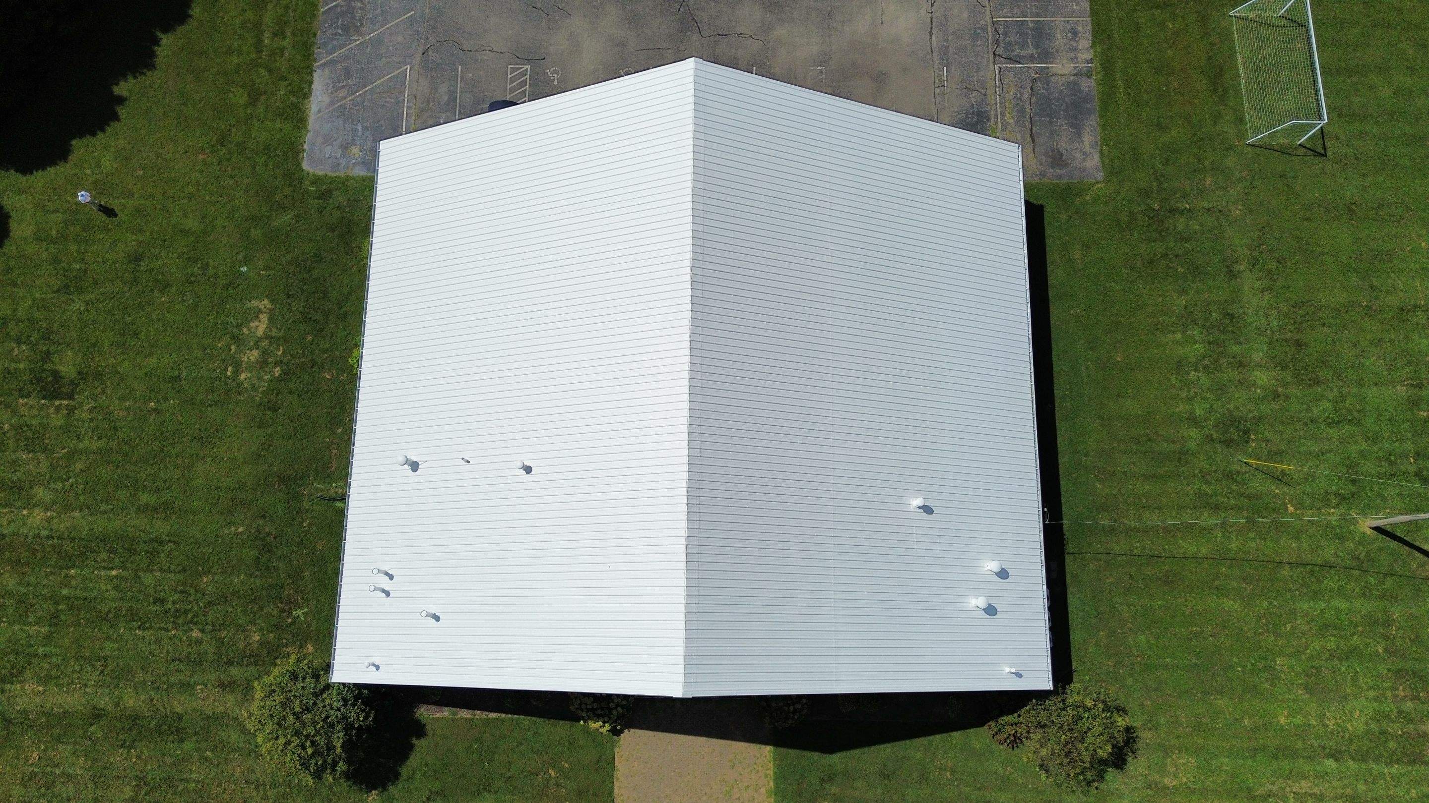 Metal Roof Restoration by Commercial Roofing Pros