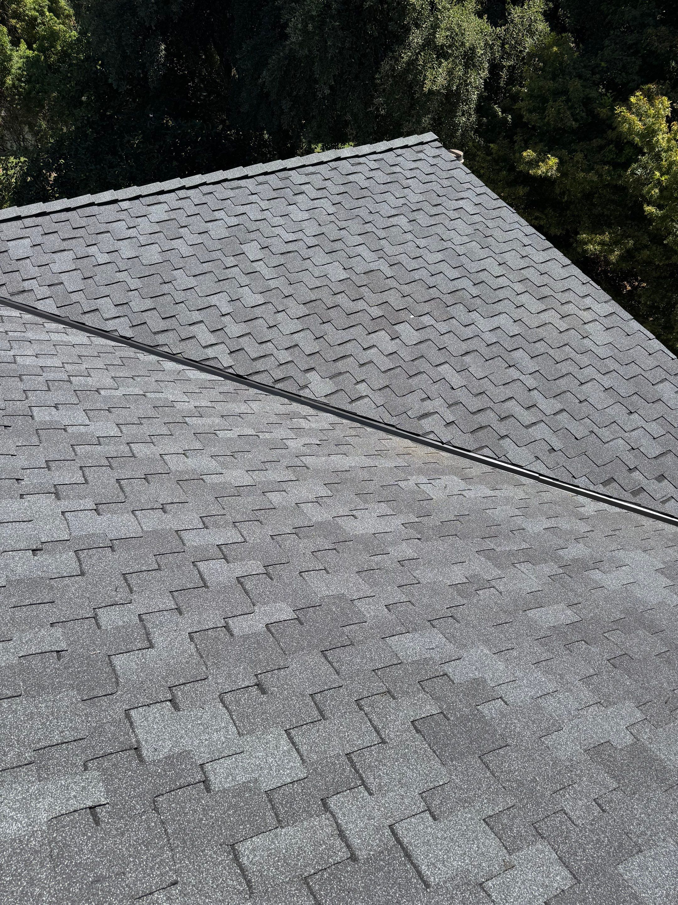 Presidential shingle roof by Straight Edge Roofing Inc