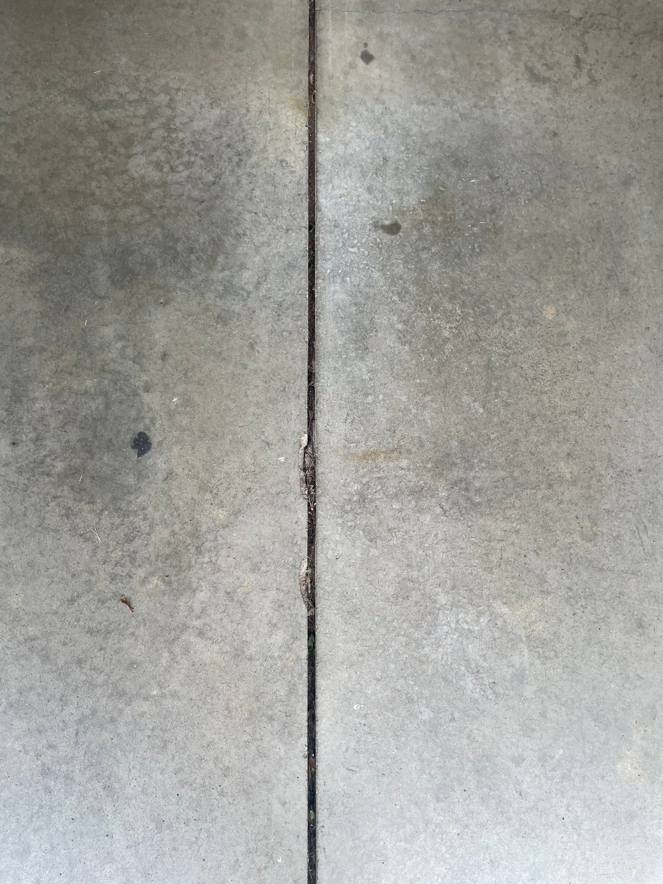 Multi-Car Garage Floor Coating and Crack Repair in Tea by Select Painting, Coatings & Garage Cabinets