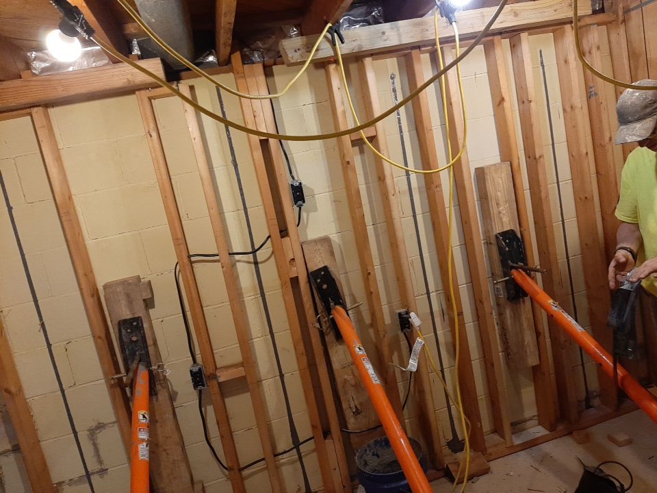 Wall Straightening and Reinforcement using Embedded Fiber Reinforcement by Toledo Basement Repair 