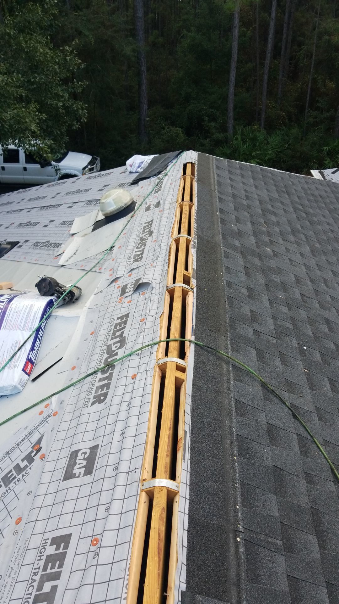 Residential Roofing Installation using Roof Replacement by American Roofing & Construction LLC