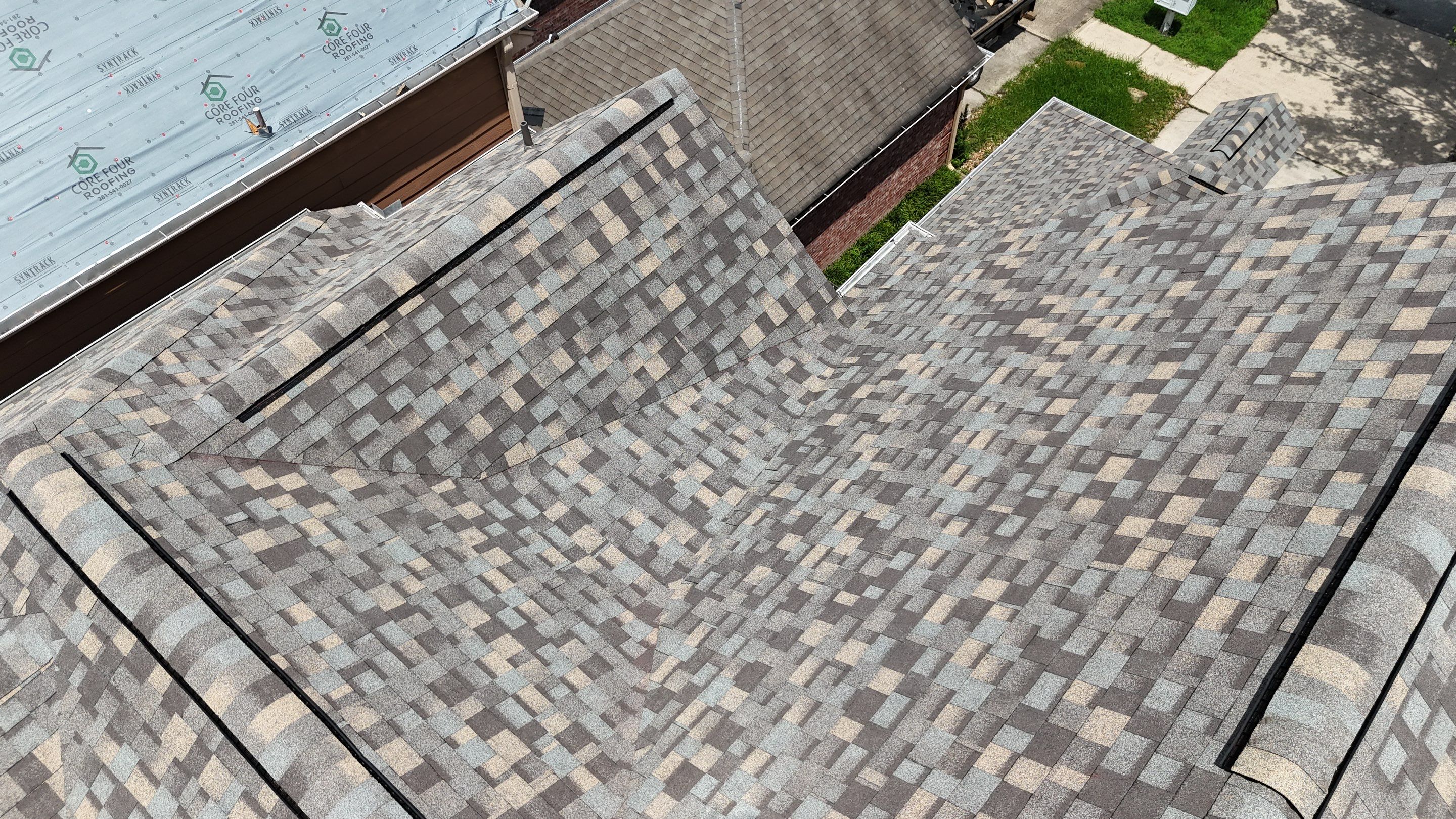 Residential Roofing Installation on a Highrise Duplex using IKO Dynasty by Core Four Roofing