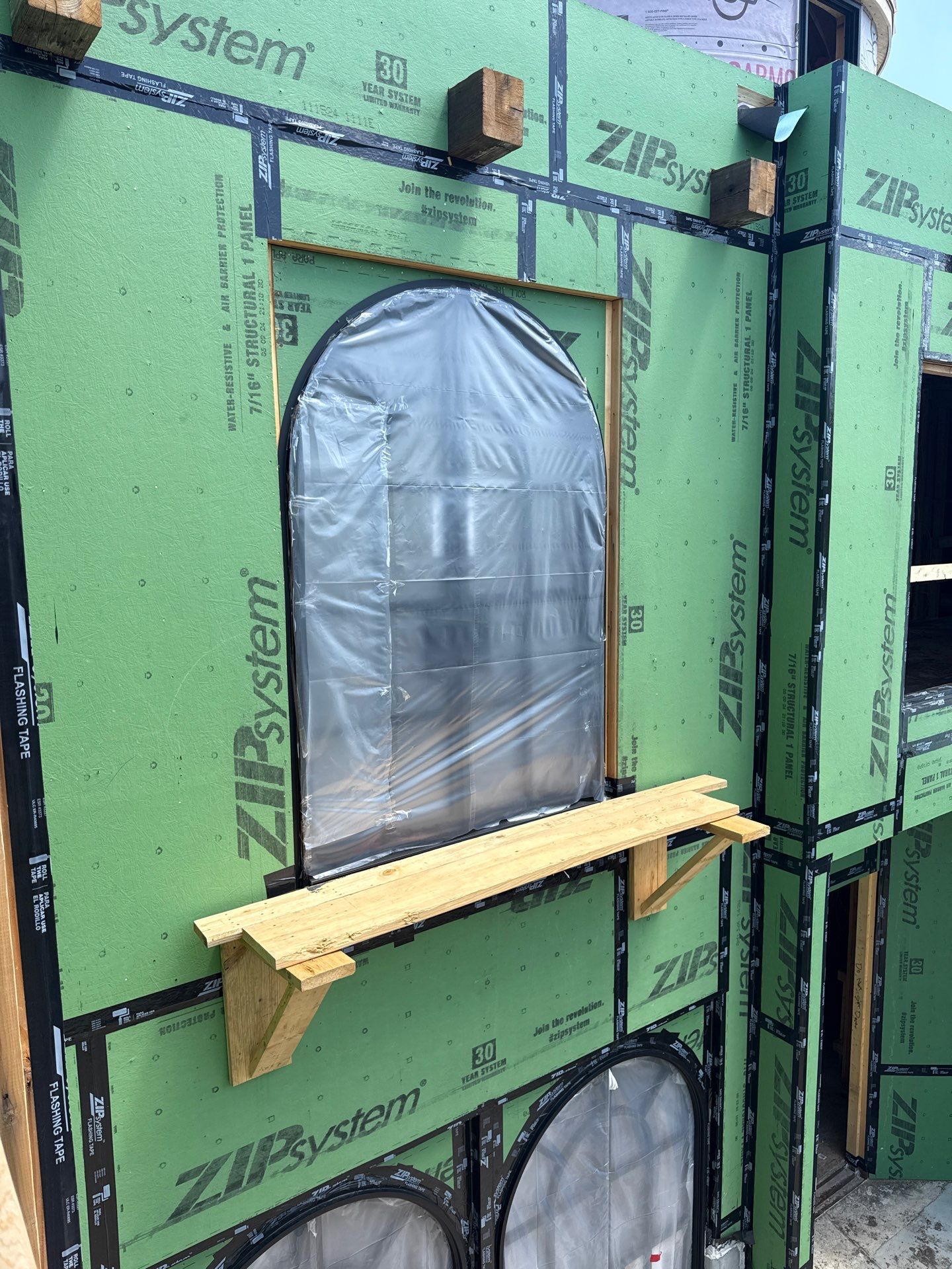 Arched Black Metal French Door Installation and Finishing in Fort Worth by Solara Custom Living