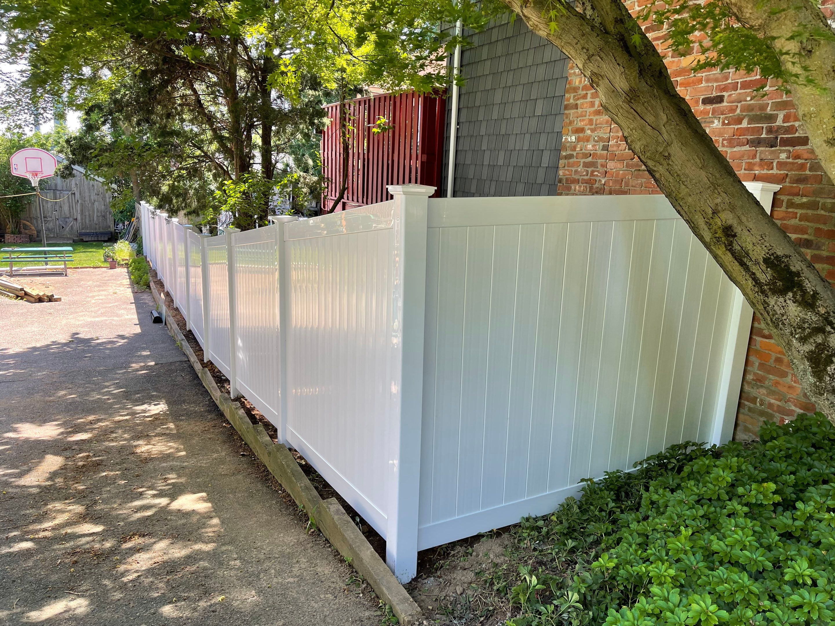 Replacement Vinyl Privacy Fence in White by DiGiorgi Roofing and Siding Inc