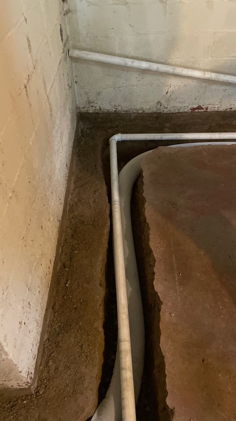 Interior Drain Tile & Sump Pump System in North Minneapolis by Waterproofing Northeast