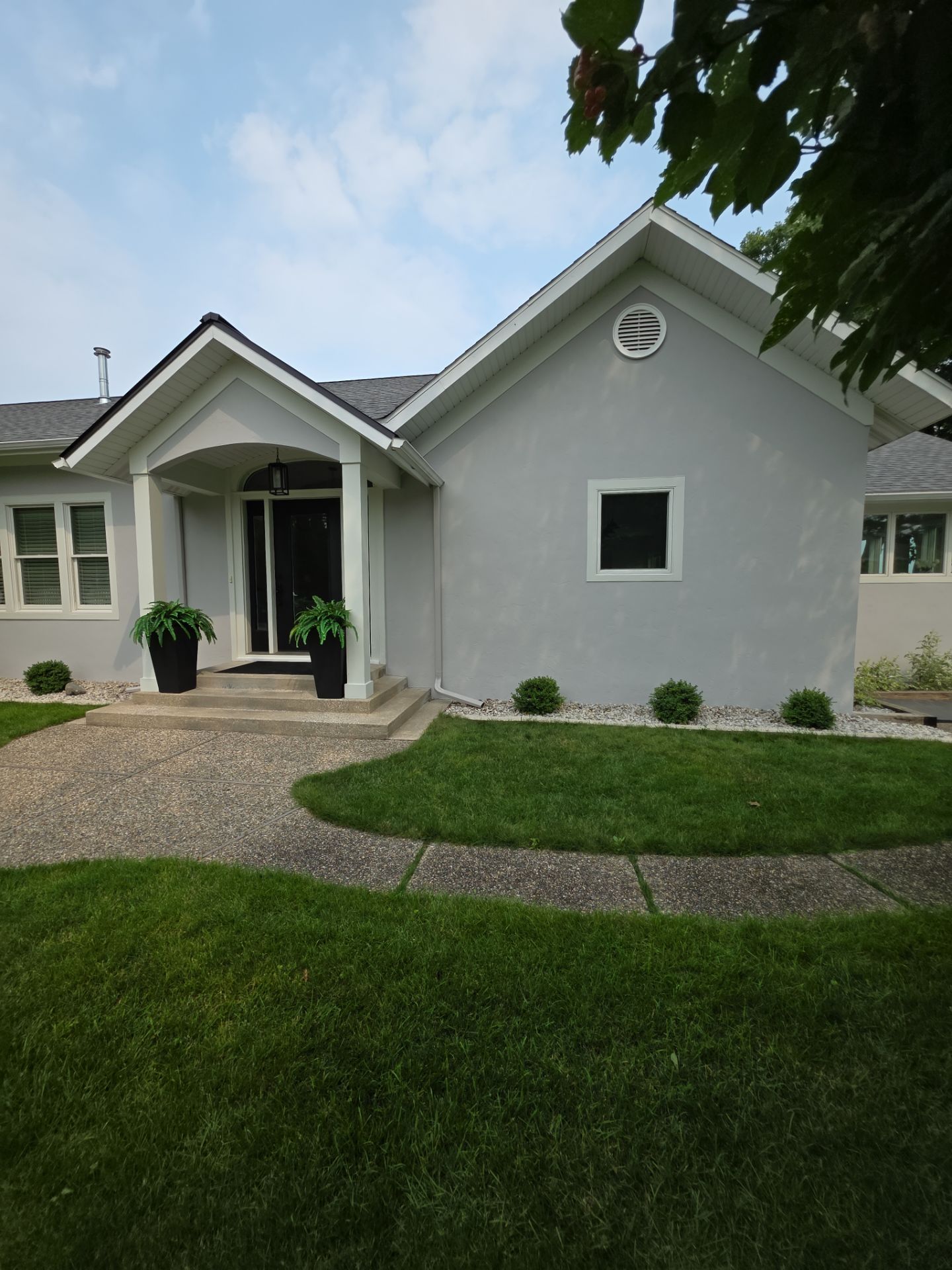 Norton Shores Residential Stucco Repair and Exterior Painting Refresh by Gordon Painting