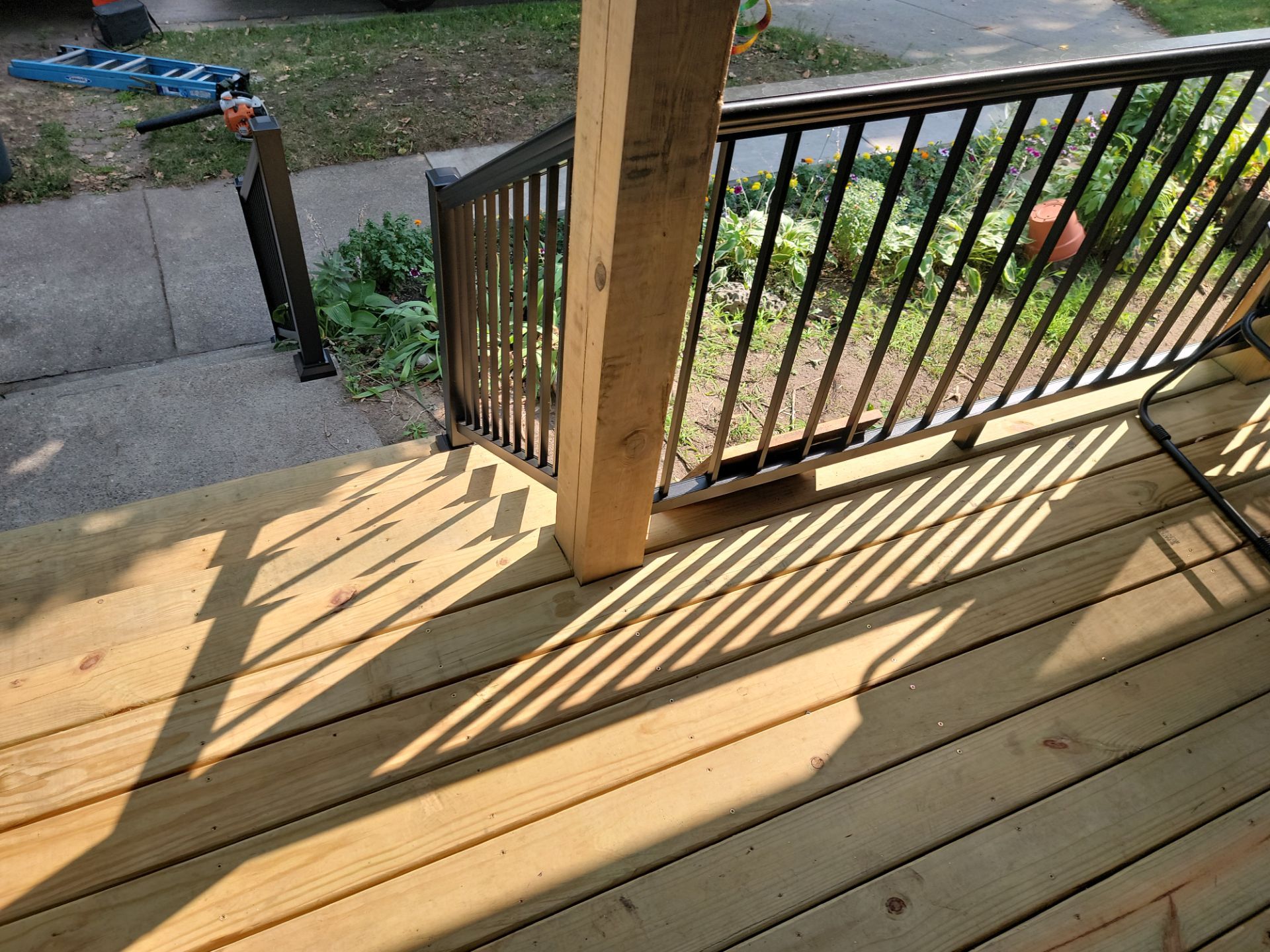 SIDING, DECK AND NEW PORCH  by Avalon Roofing and Exteriors