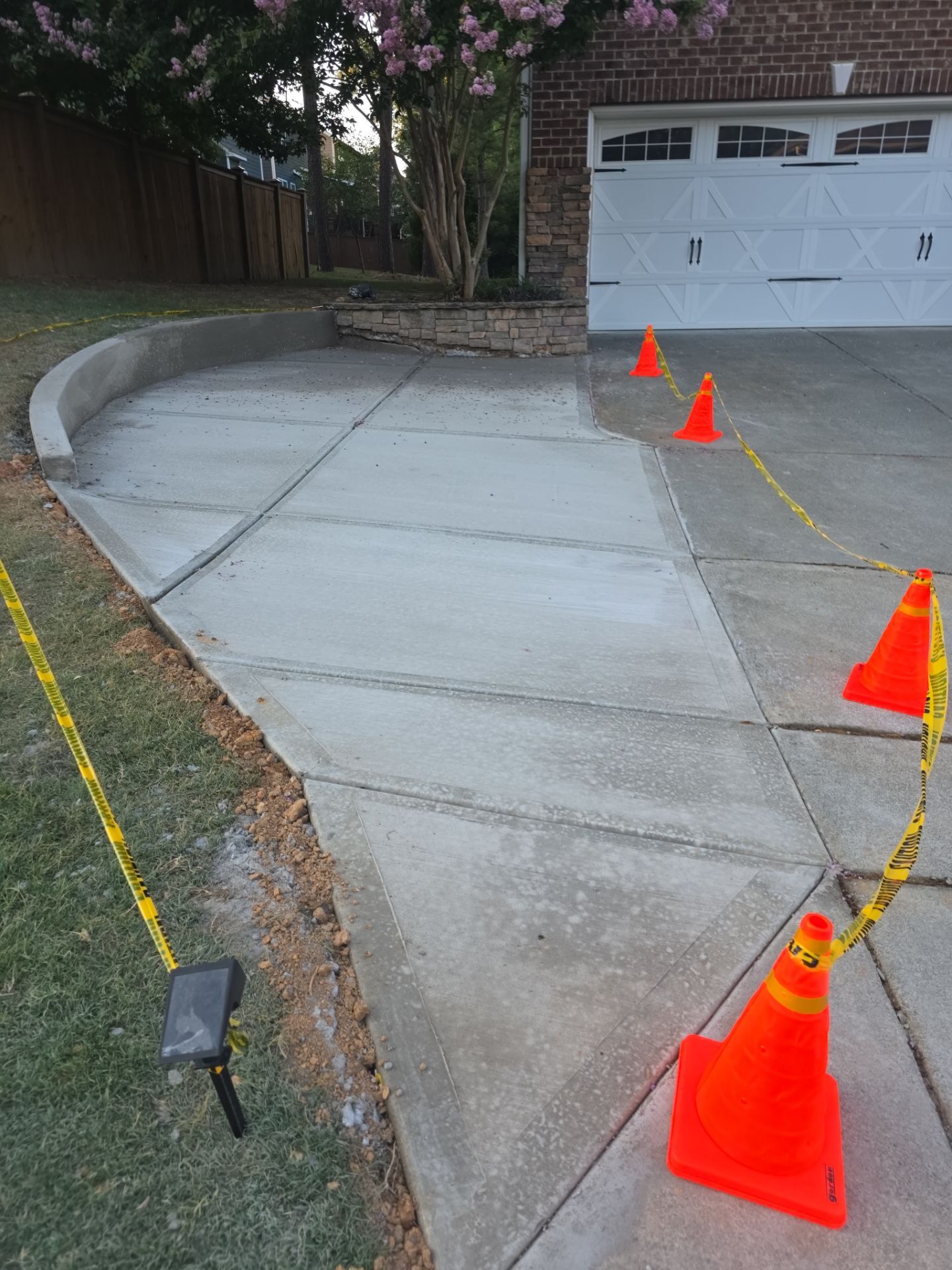 Concrete Driveway Expansion & Retaining Wall | Apex, NC by Elite Remodeling and Design LLC