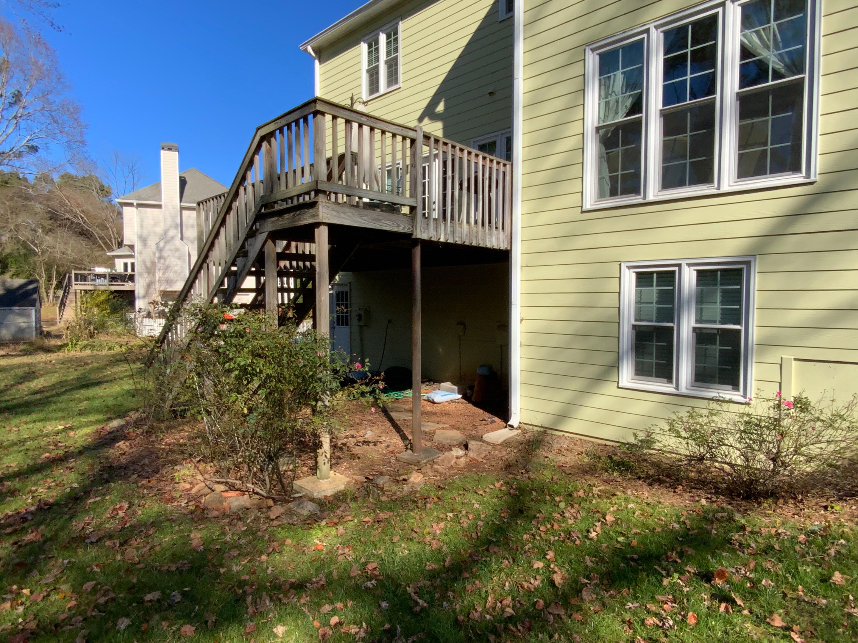 Elevated Grey Composite Deck Installation in Woodstock, Georgia by Swift Home Renovations