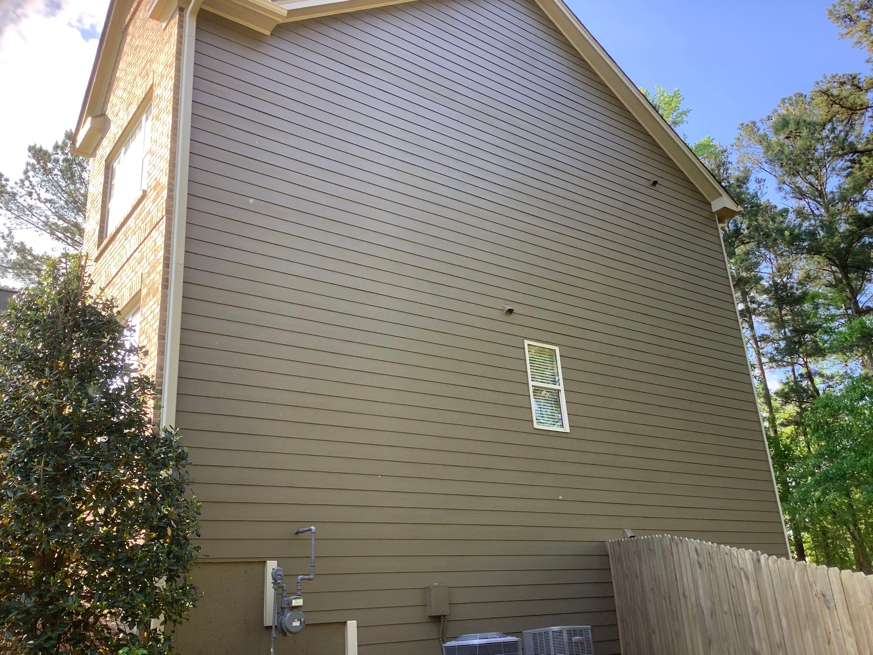 Multi-Surface Exterior Painting for Two-Story Residence in Powder Springs by Swift Home Renovations