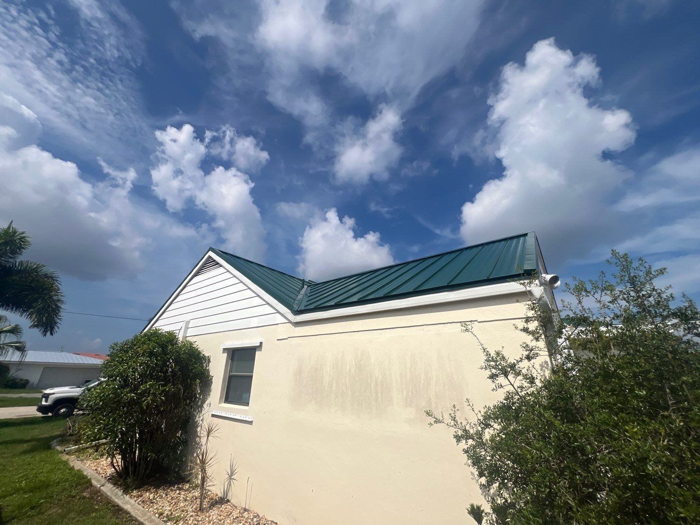 Residential Roofing Installation using Gulf Coast Metals Gulf Seam Panels by Four Peaks Roofing