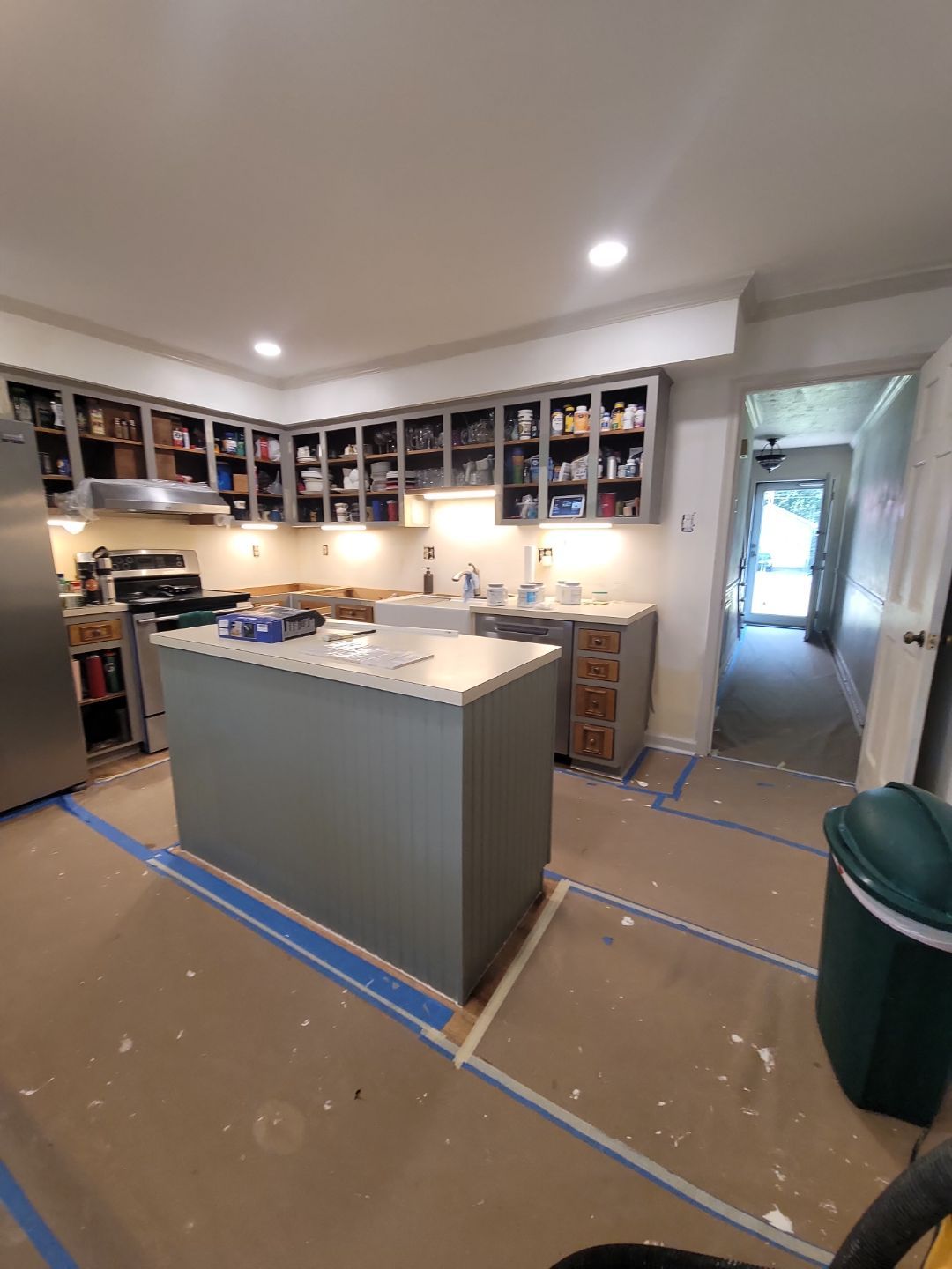 A Pathway to Personality – A Two-Tone Kitchen Transformation in Apex by Elite Remodeling and Design LLC
