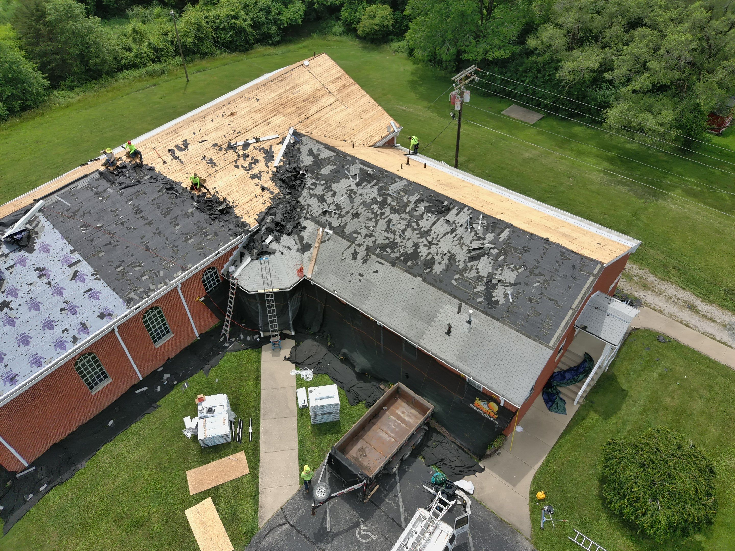 Commercial Roofing Installation using Performance Shingles by Mr. Roofer