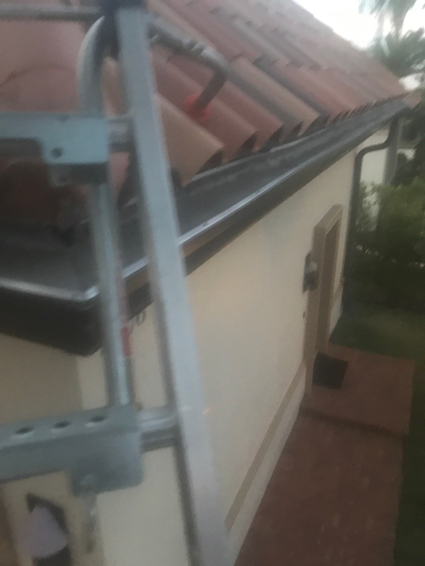 Musket Brown Seamless Gutters using Musket Brown Seamless Gutters in Cape Coral FL by Gutter Professors