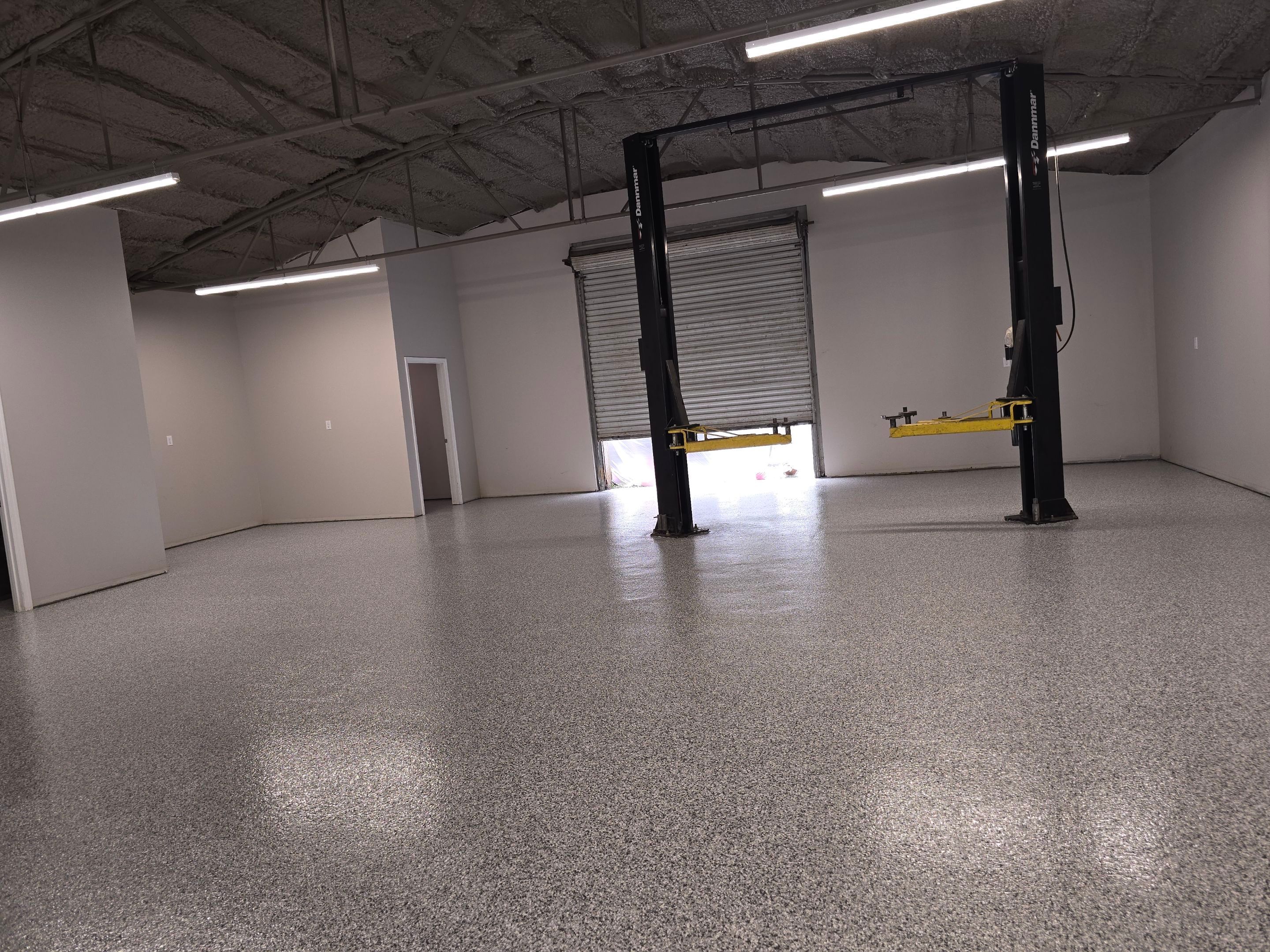Super old and oily concrete brought back to life by Elite Floor Solutions