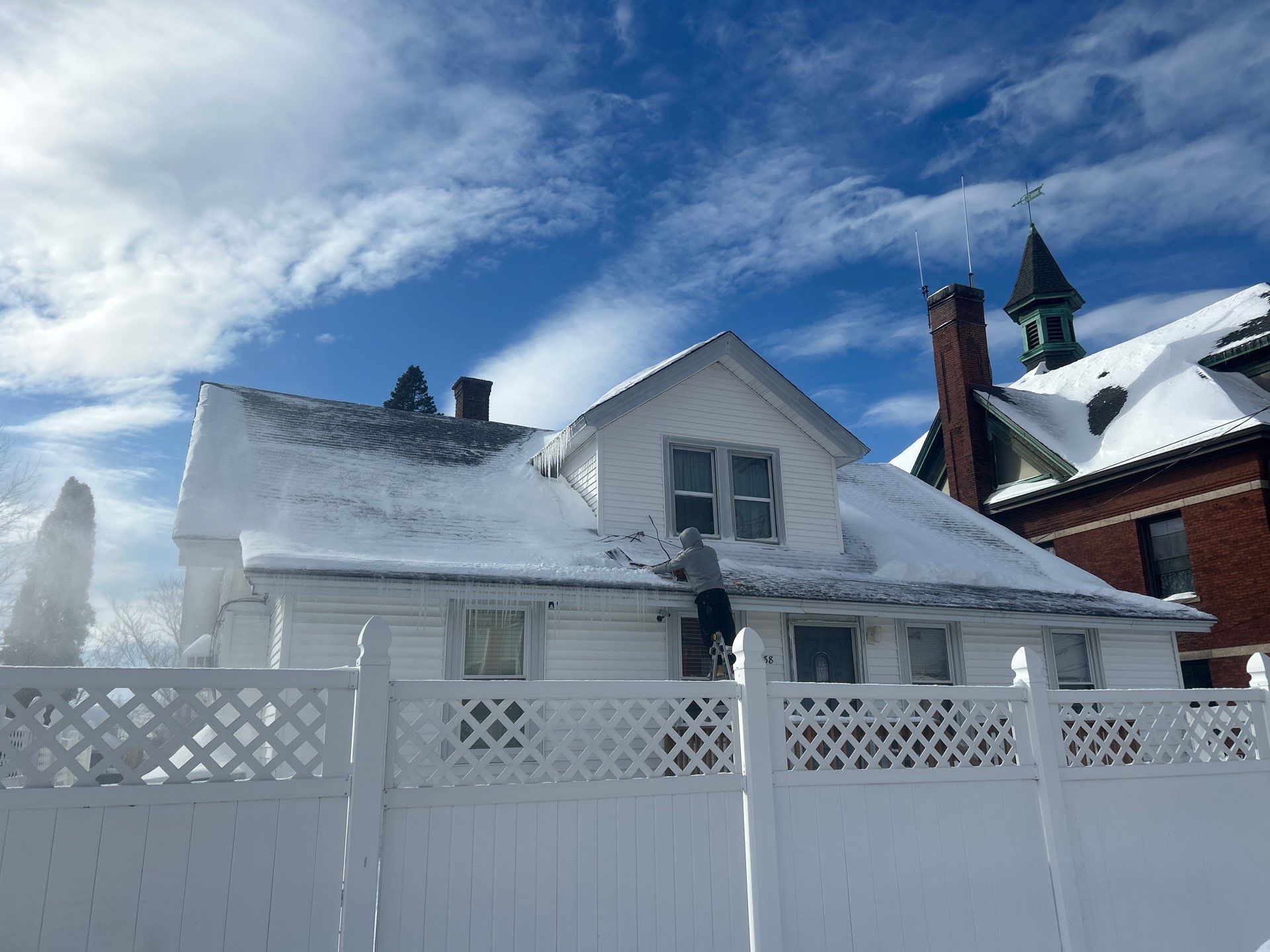 Emergency Snow Removal & Roof Tarp Installation in Lawrence, MA by Mighty Dog Roofing of Greater Middlesex County