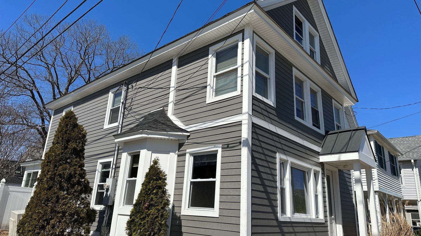 Siding Installation using Hardie Plank Aged Pewter by A Plus Exterior