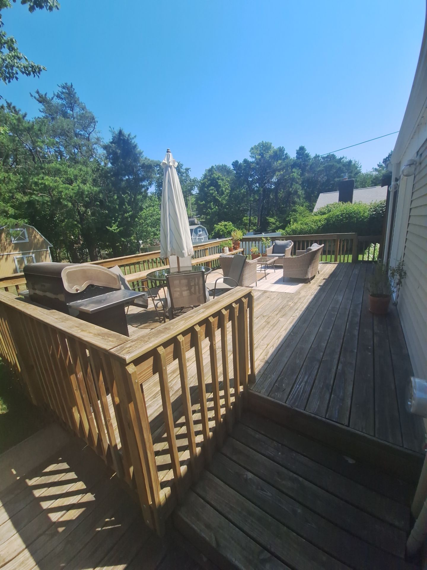 Deck Wash & Stain Transformation | Spring Lake, Michigan by Gordon Painting