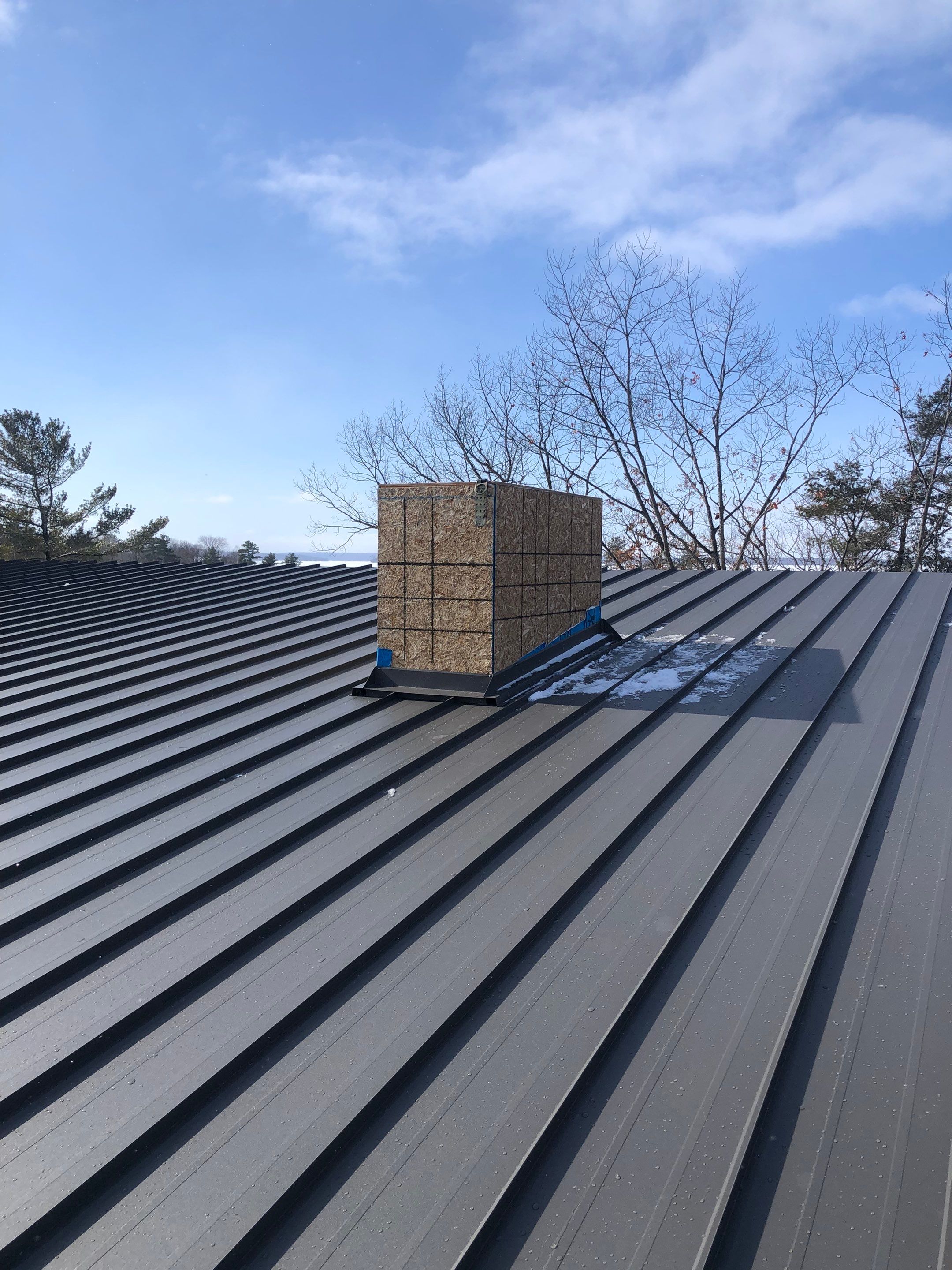 New Home Construction using 16" Standing Seam Panels by Jay Carter Roofing & Sheet Metal
