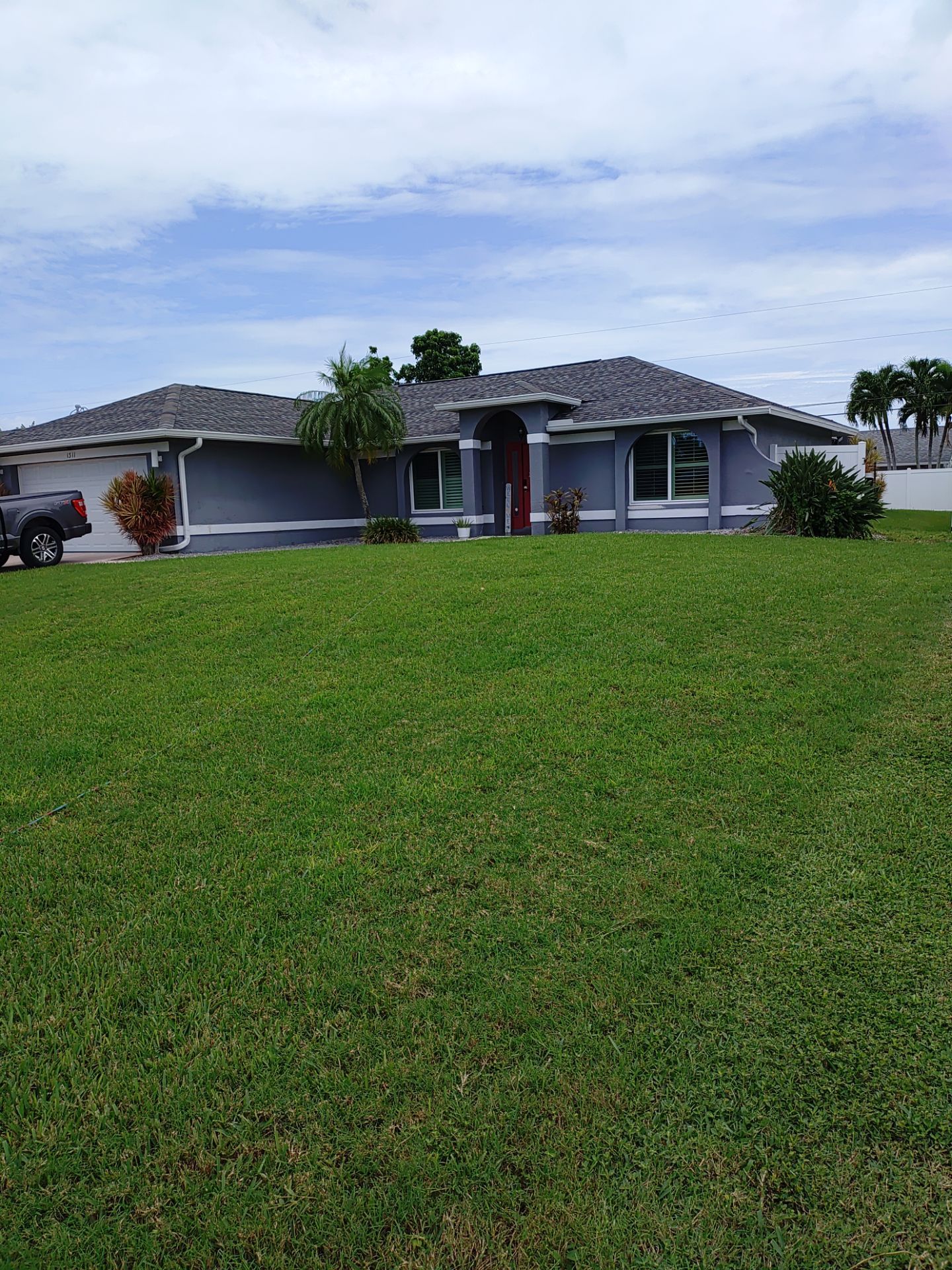3x4 Downspouts Bronze Installation in Cape Coral FL by Gutter Professors