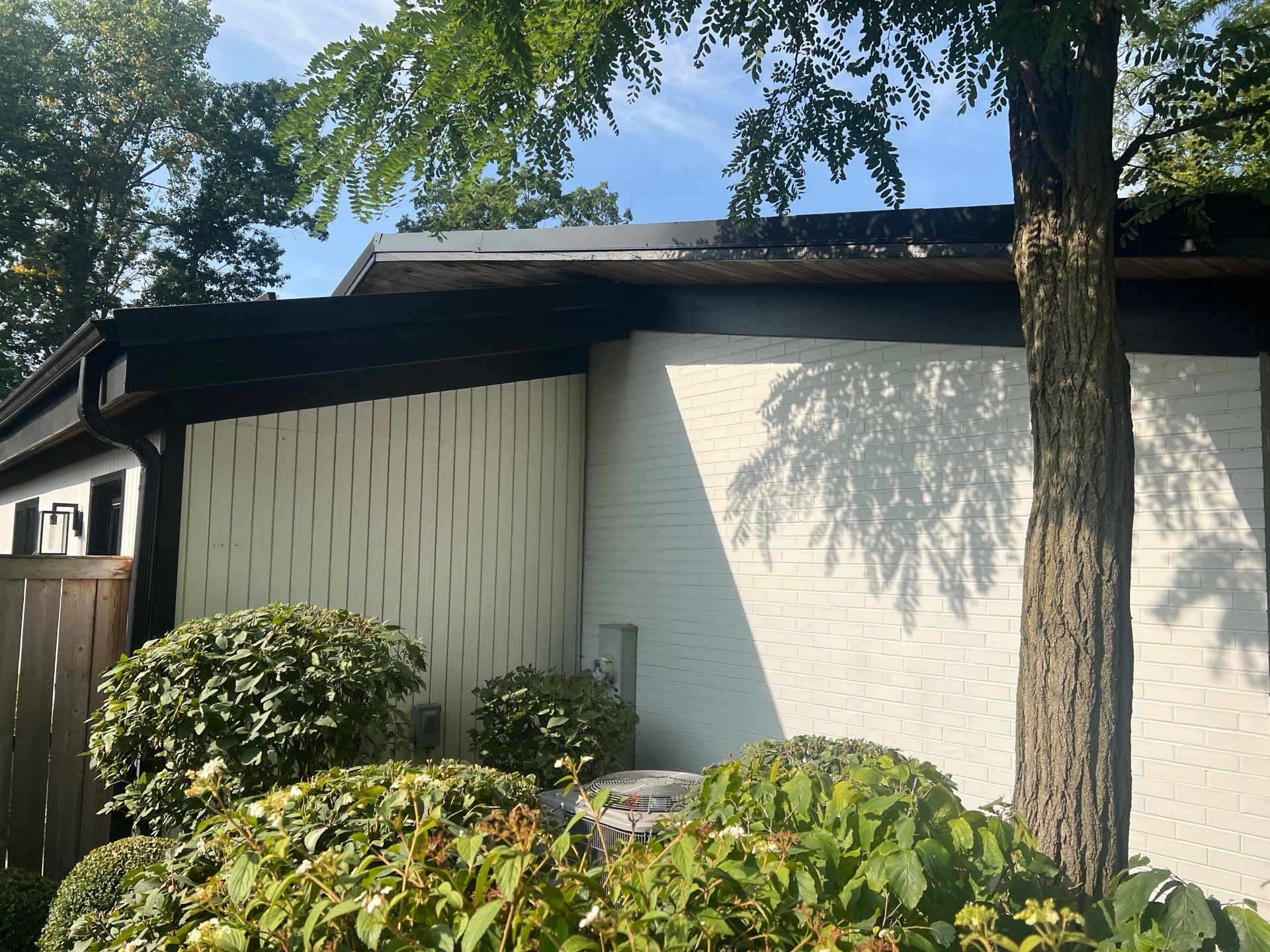 Complete Exterior House, Bluestone & Garage Floor Cleaning by Northern Power Washing LLC.