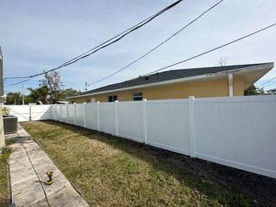 Vinyl Fence Installation using Vinyl Privacy Fence 