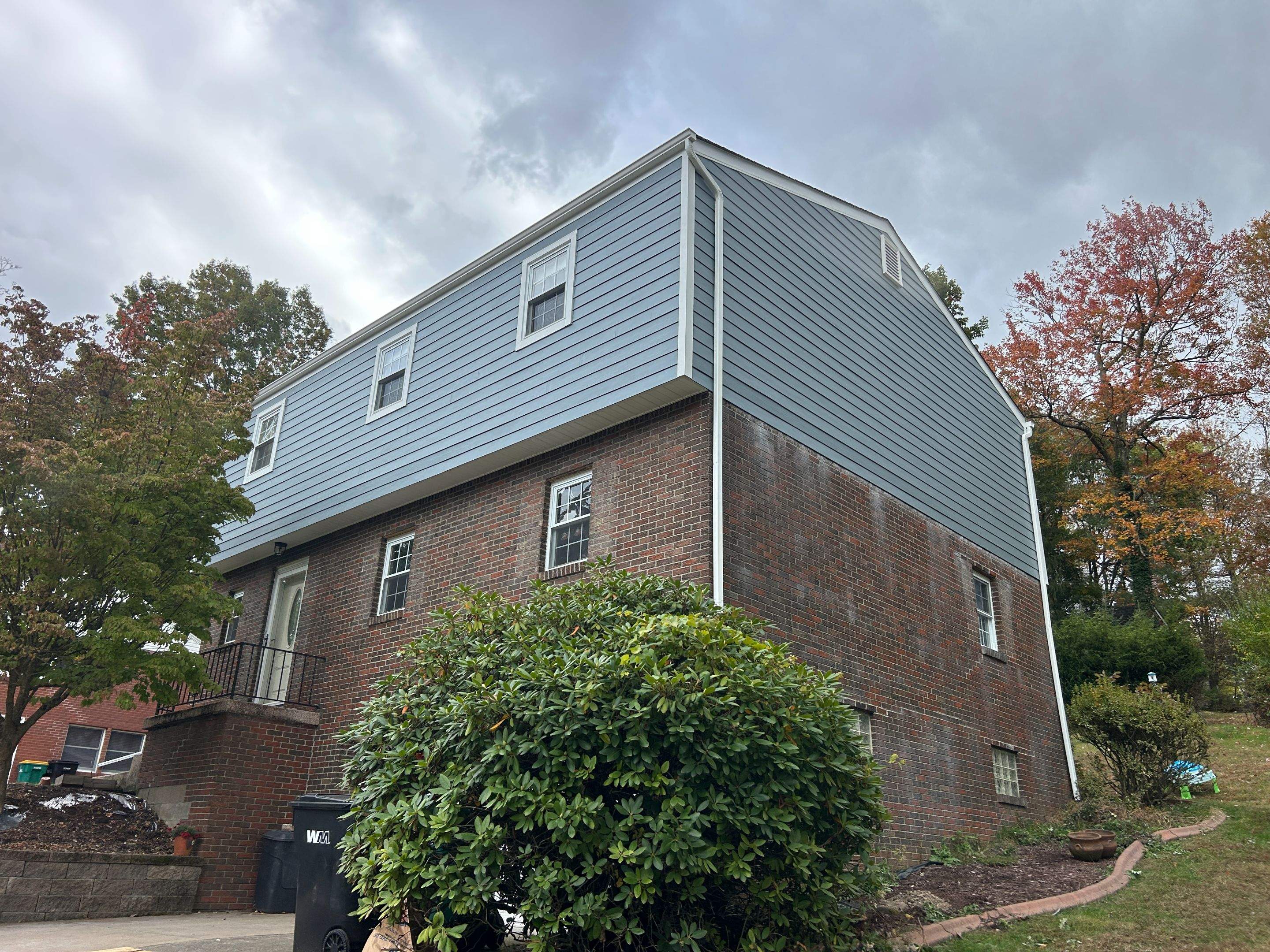 Full Exterior Siding Replacement with Blue Horizontal Panels in Pittsburgh by Ideal Siding Pittsburgh