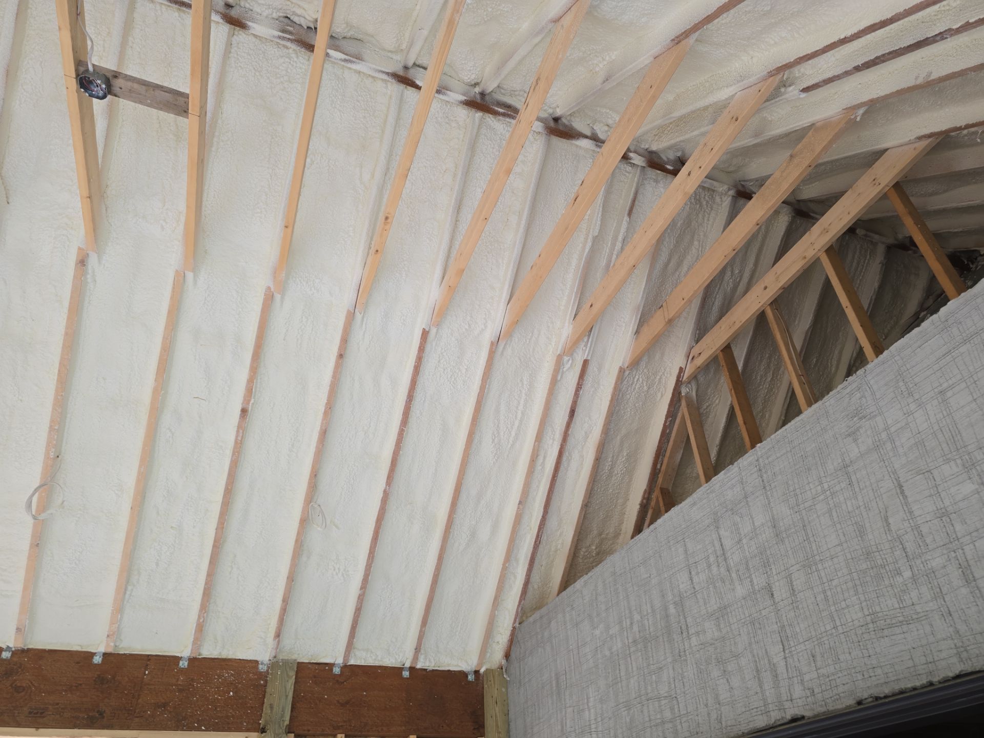 Basement Exterior Walls using Closed Cell Spray Foam by NYS Foam & Energy
