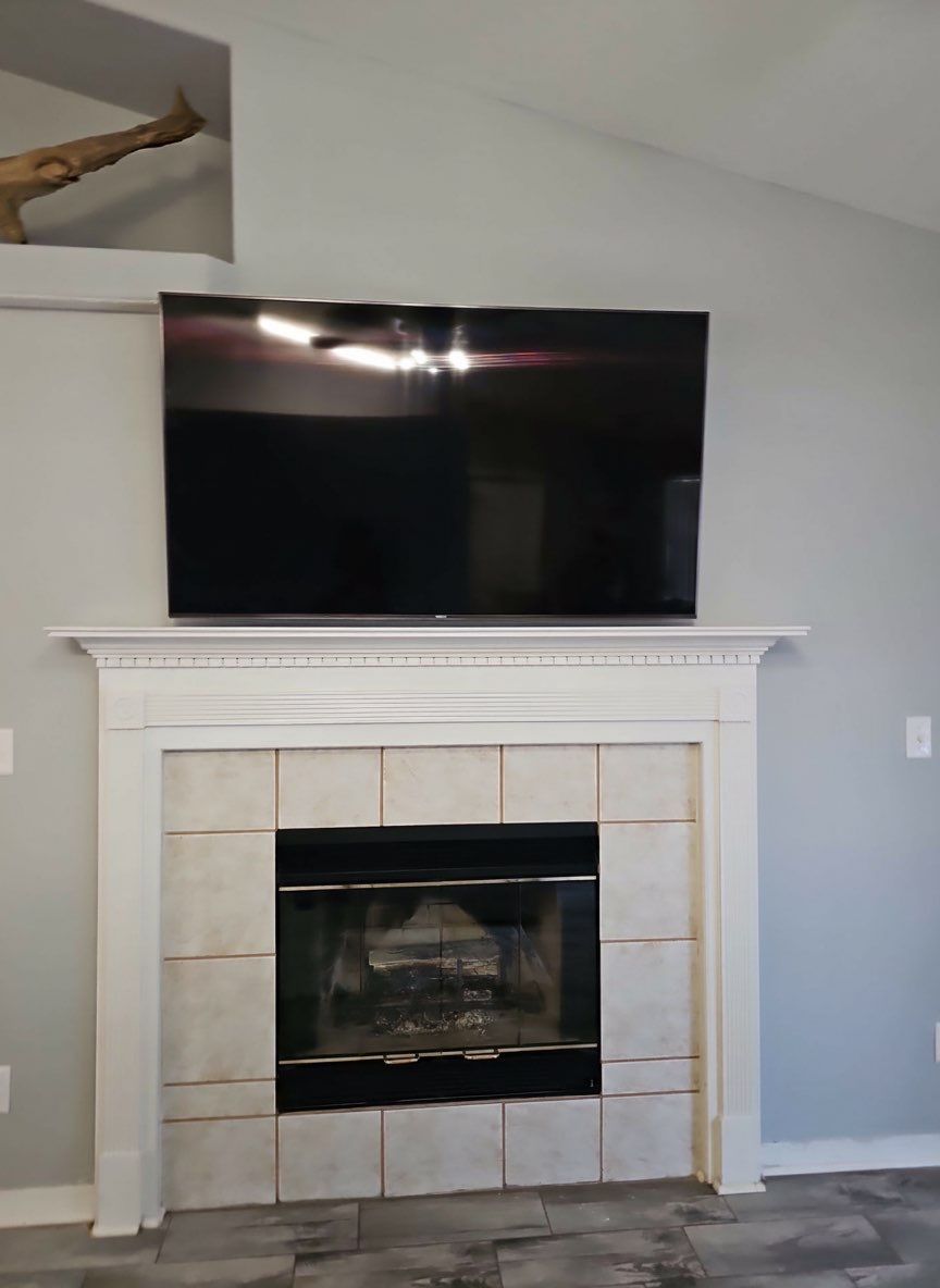 Fireplace TV Mounting Projects by Hangman Mounting & Installation 