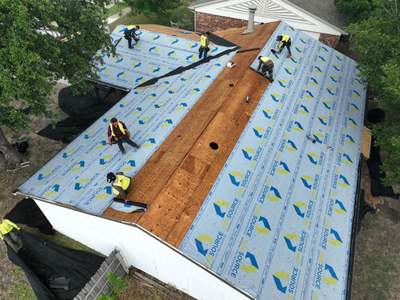 Residential Roofing Installation using Malarkey Highlander Weathered Wood Plus