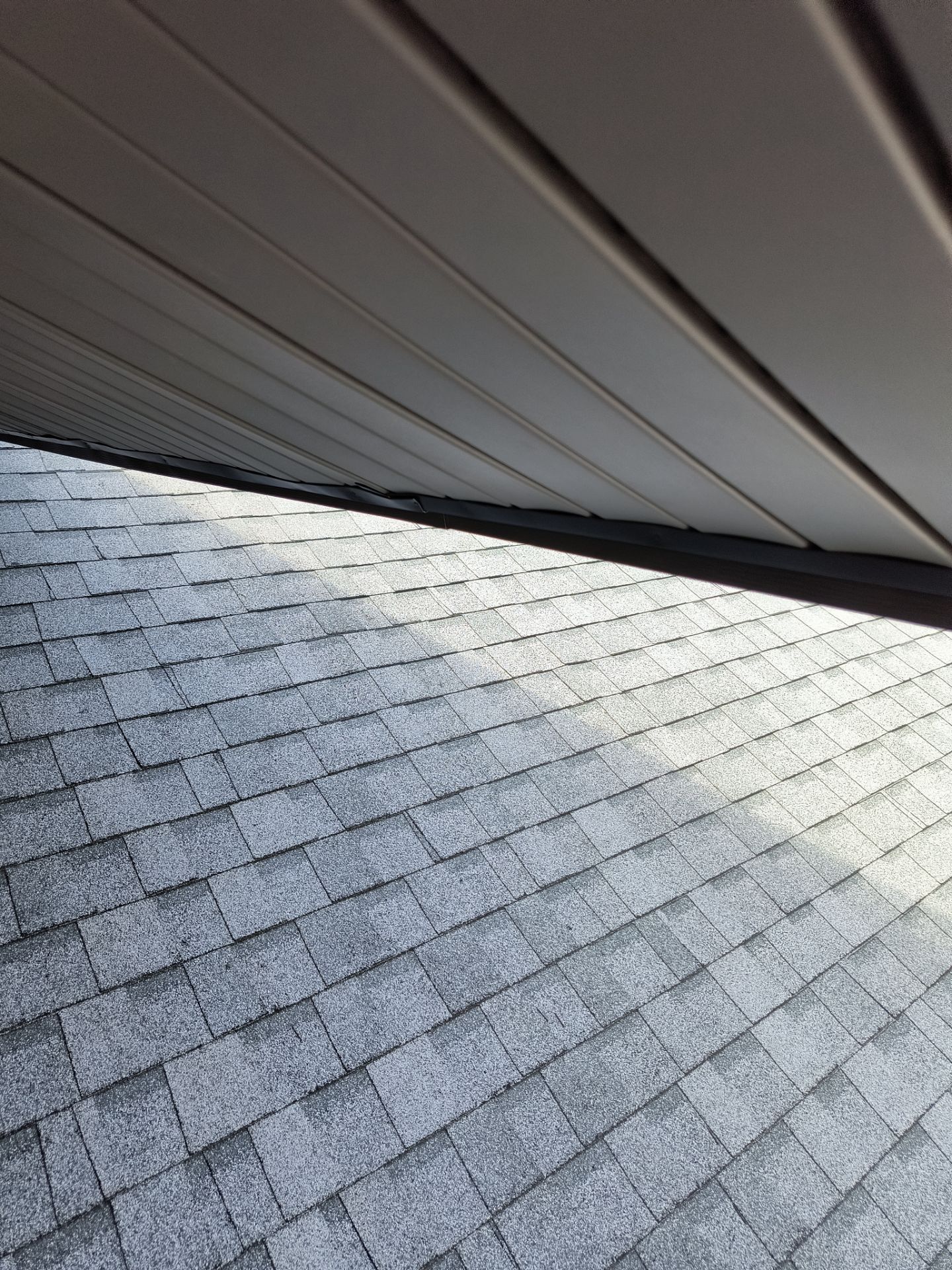 Black Seamless Gutters in Sarasota FL by Gutter Professors