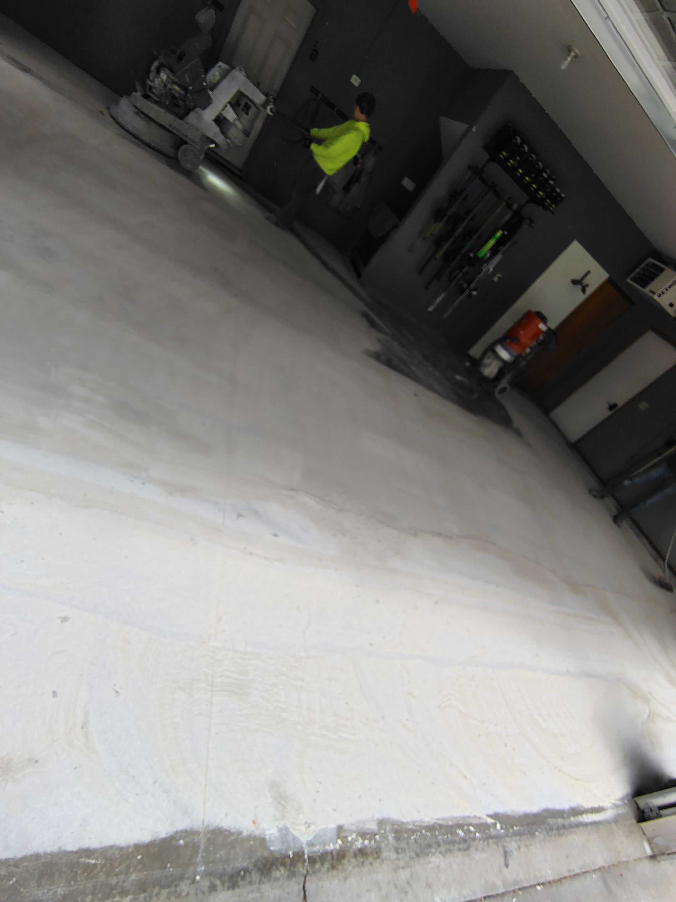 Garage Floor Concrete Coating and Crack Repair in Sioux Falls by Select Painting, Coatings & Garage Cabinets