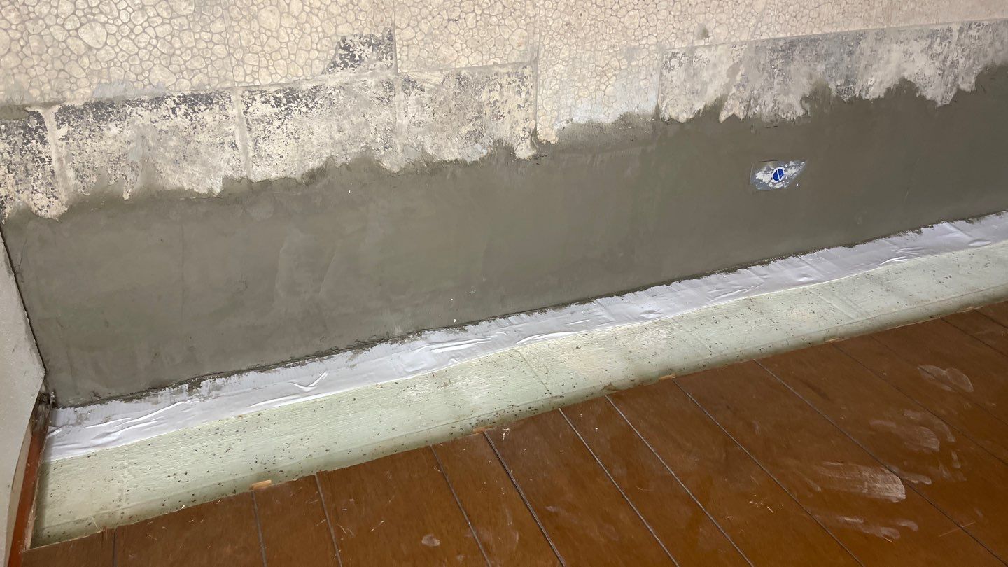 Interior Waterproofing Using GrateDrain™ Products by Toledo Basement Repair 