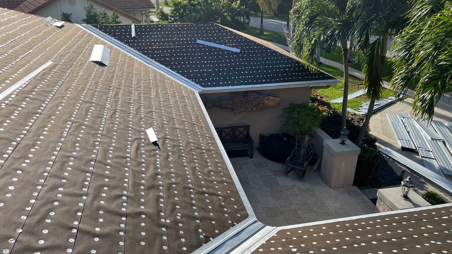 Residential Roofing Installation using 1" Nail strip metal roof by BLUES BROTHERS ROOFING