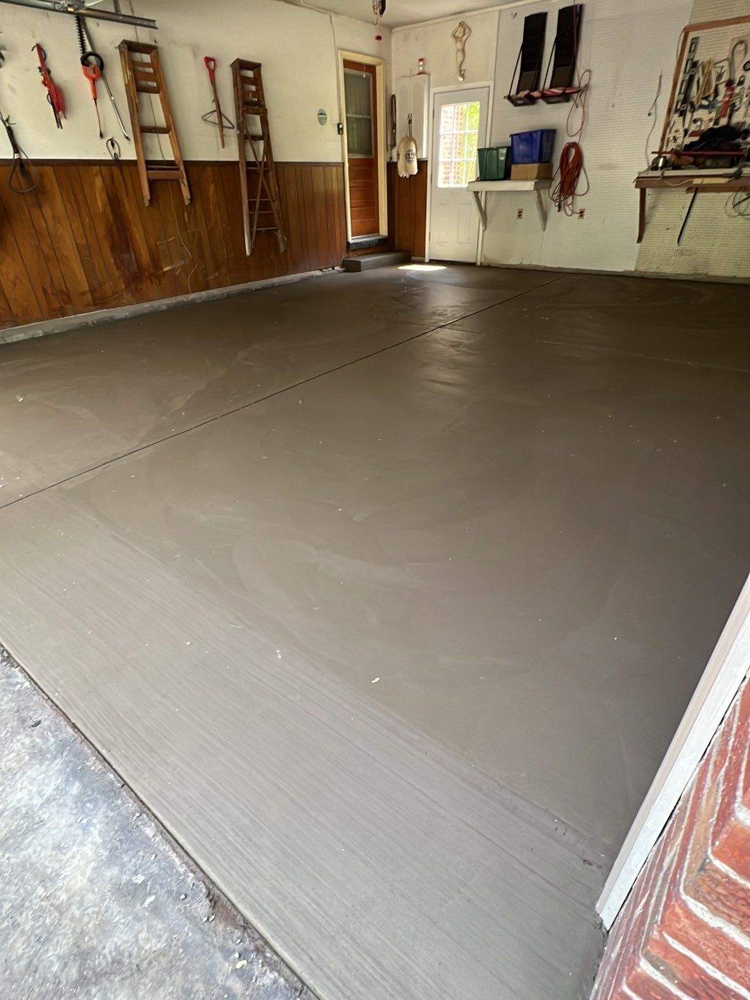 Concrete garage floor replacement  by NG Masonry & Construction LLC
