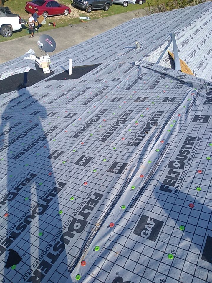 Residential Roofing Installation using Roof Replacement by American Roofing & Construction LLC